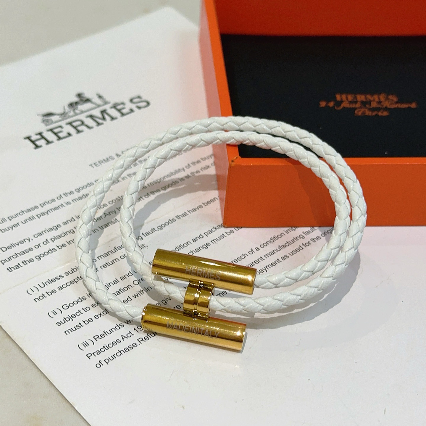 Pulsera Hermes Tournis Tresse cuero trenzado blanco herrajes de metal chapado en oro 38 cm doble vuelta
