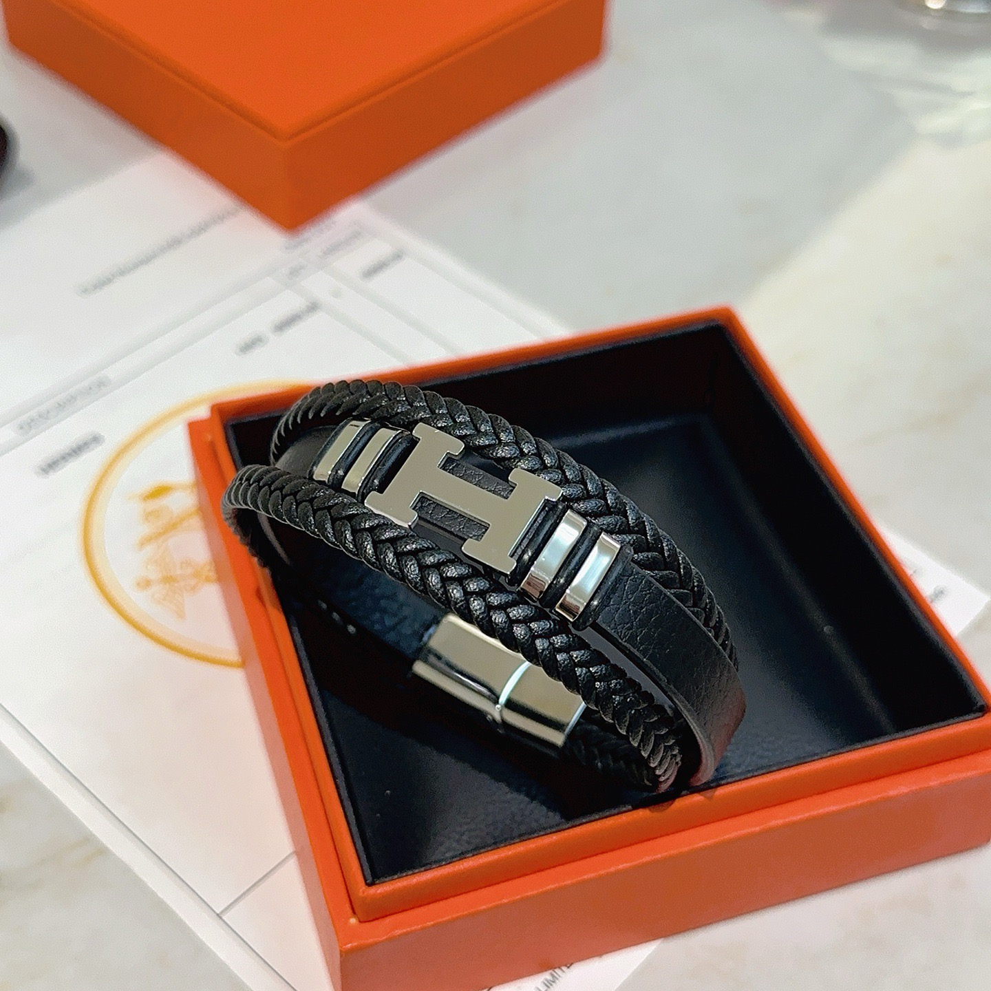 Bracciale Hermes New Anger Forest H Logo Bracciale in pelle intrecciata Pelle intrecciata nera Hardware in metallo placcato palladio argentato 19 cm