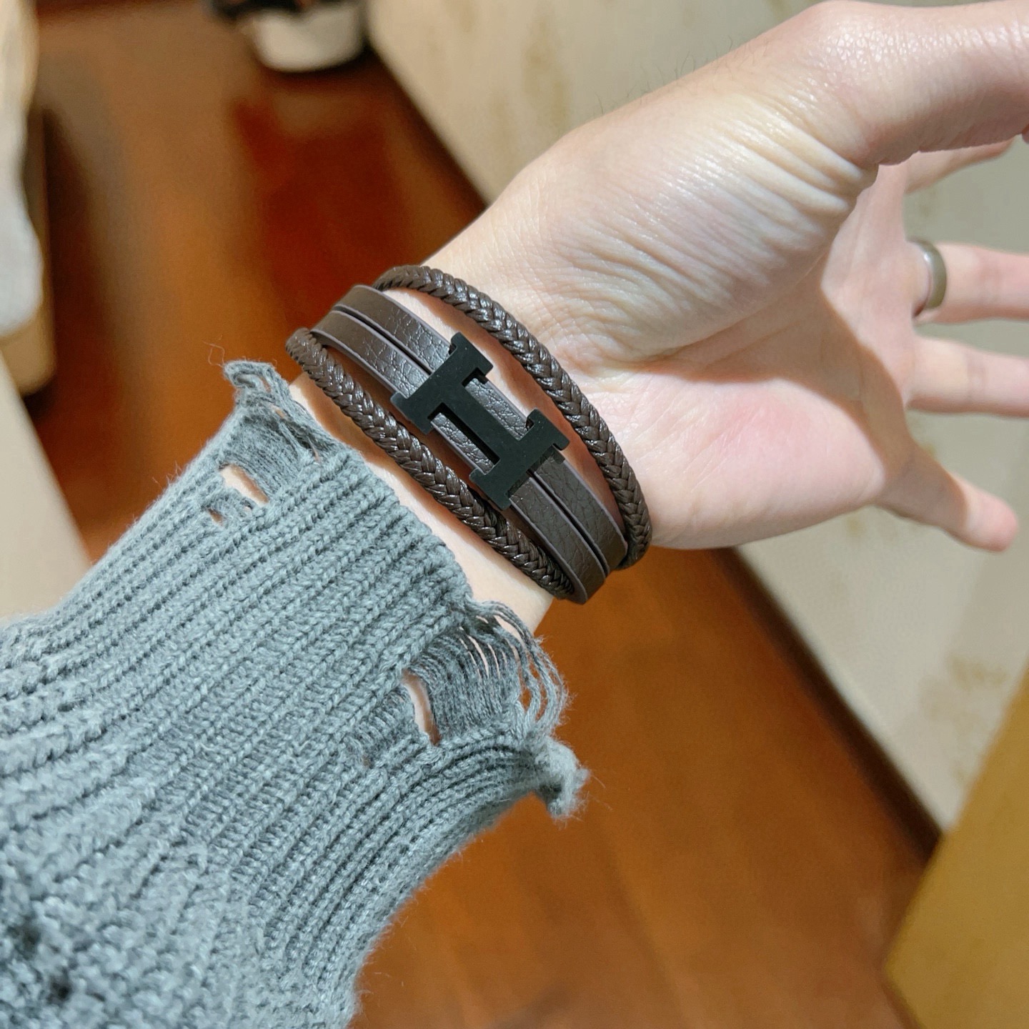Pulseira Hermes H couro preto fosco metal marrom escuro 19 cm