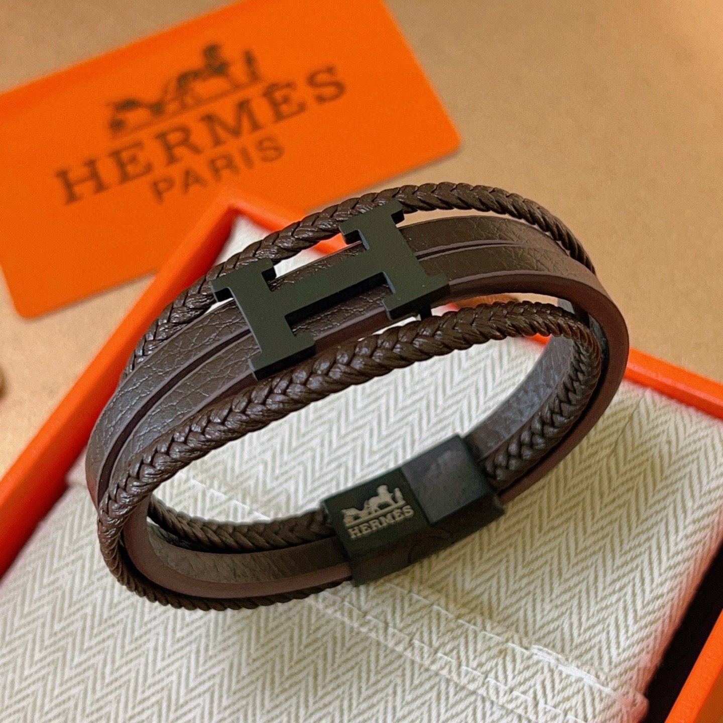 Pulseira Hermes H couro preto fosco metal marrom escuro 19 cm