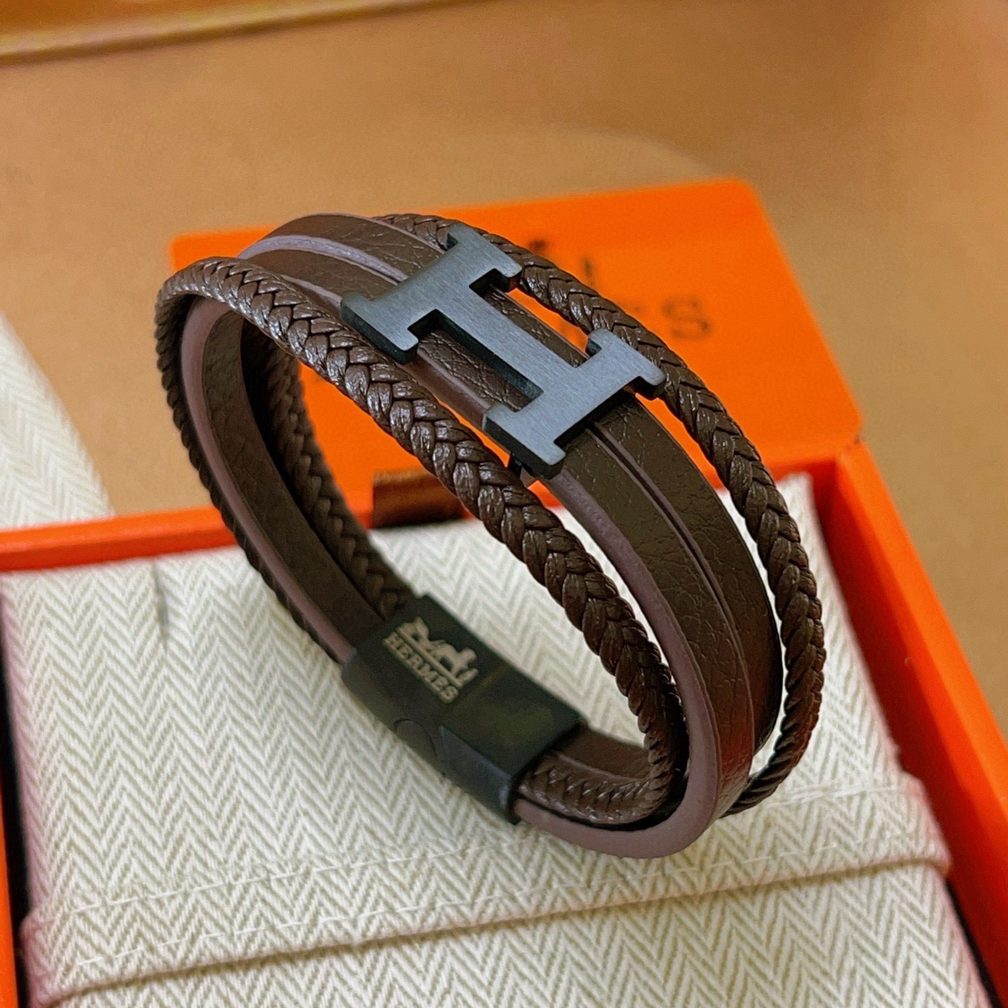 Pulseira Hermes H couro preto fosco metal marrom escuro 19 cm