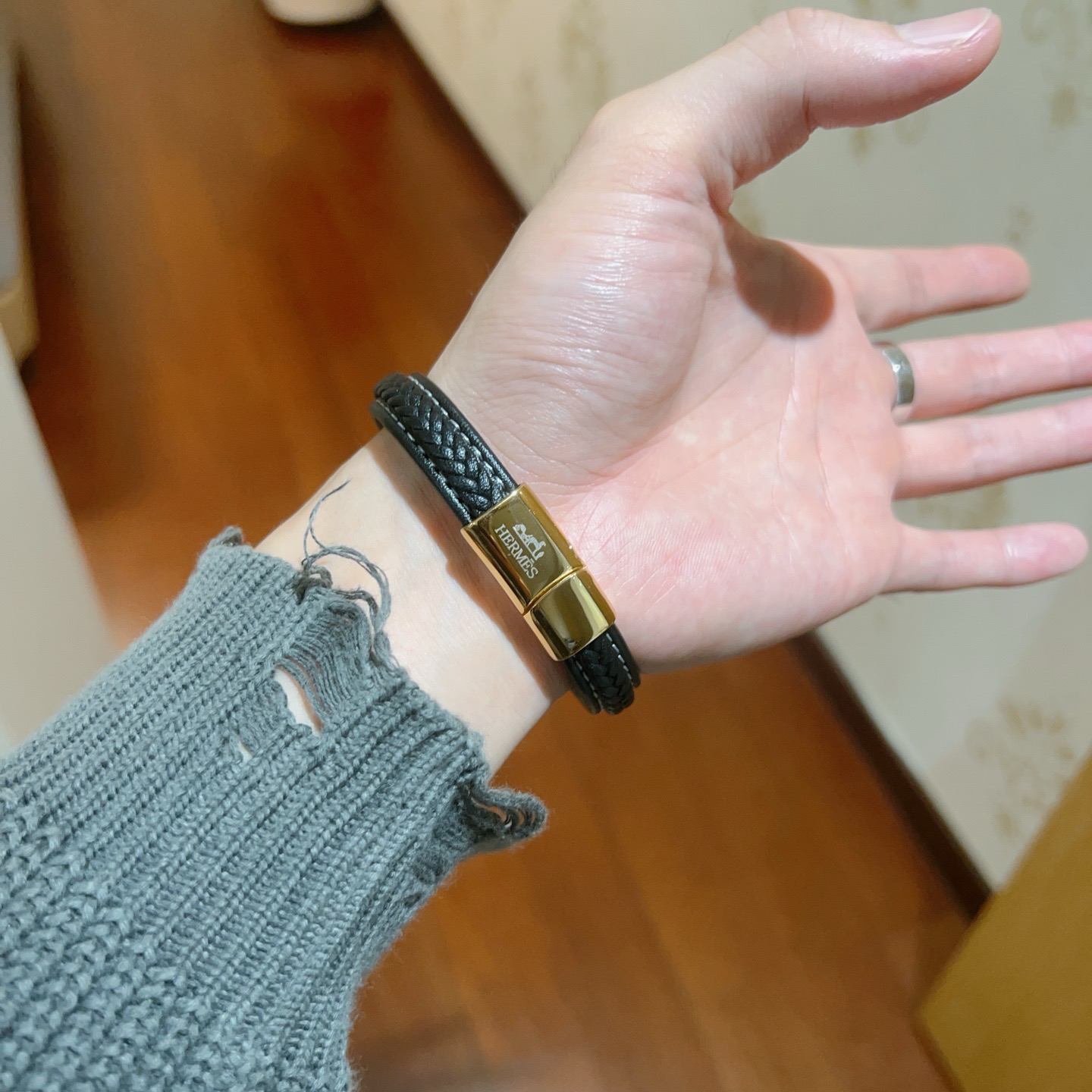 Bracciale Hermes Anger Forest Pelle intrecciata nera con hardware in metallo color oro e accento in onice nero 18 cm