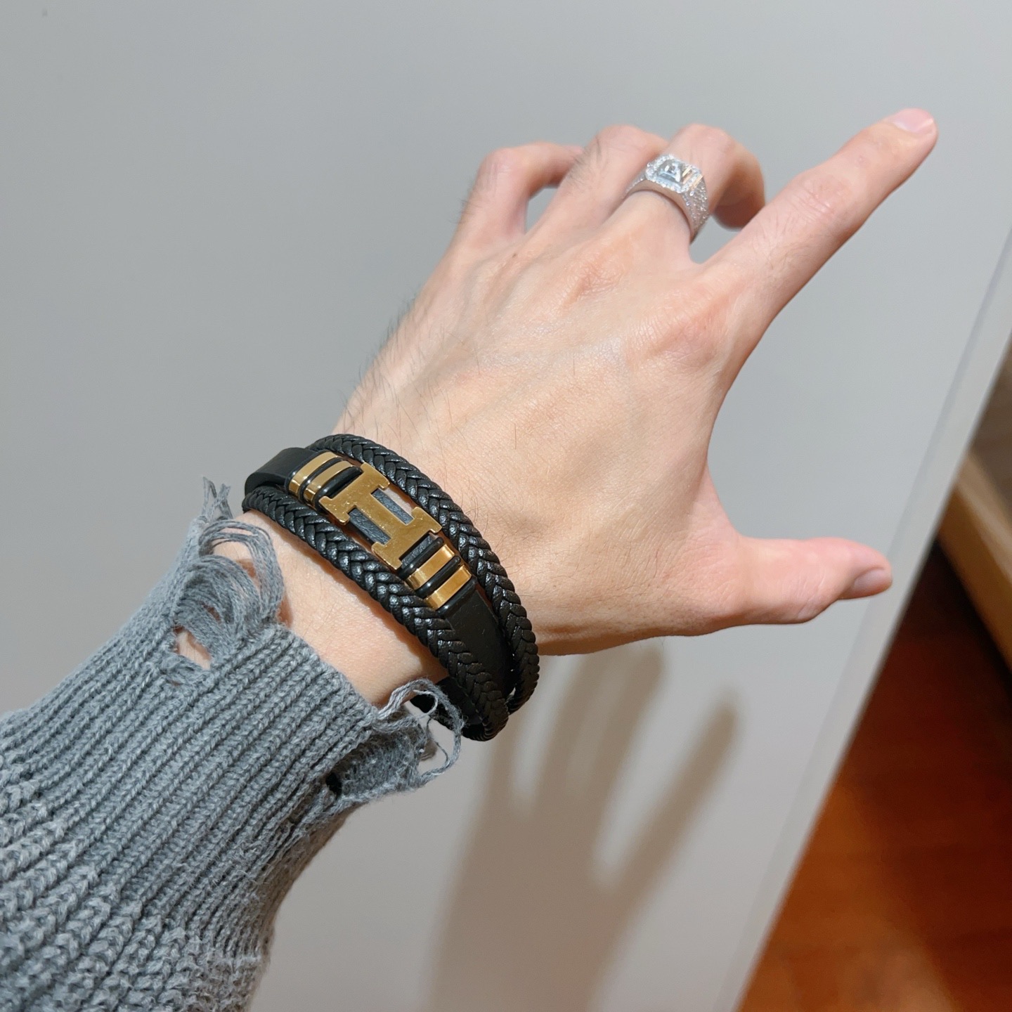 Bracciale Hermes New Anger Forest H Logo in pelle intrecciata nera hardware in metallo color oro 19 cm