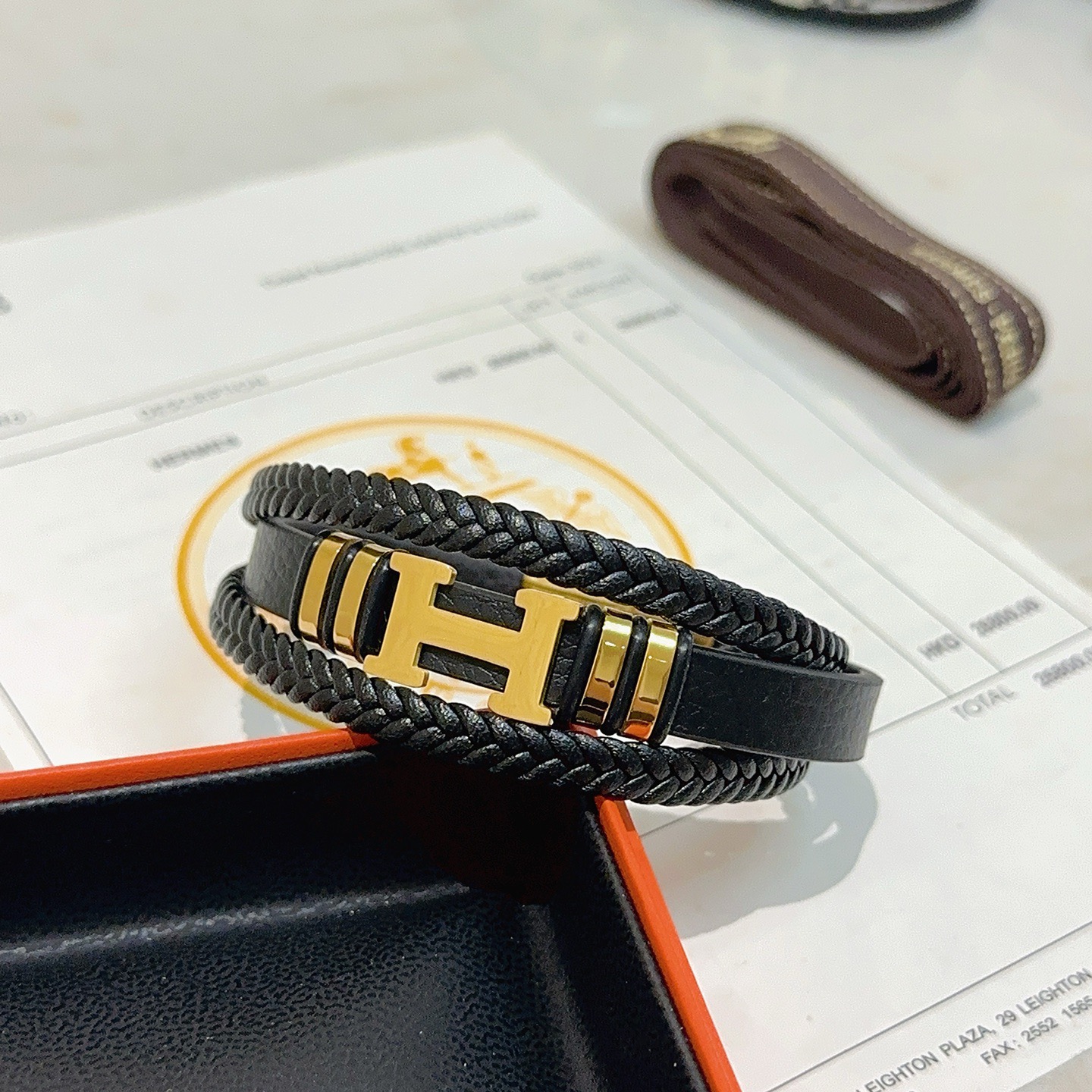 Bracciale Hermes New Anger Forest H Logo in pelle intrecciata nera hardware in metallo color oro 19 cm