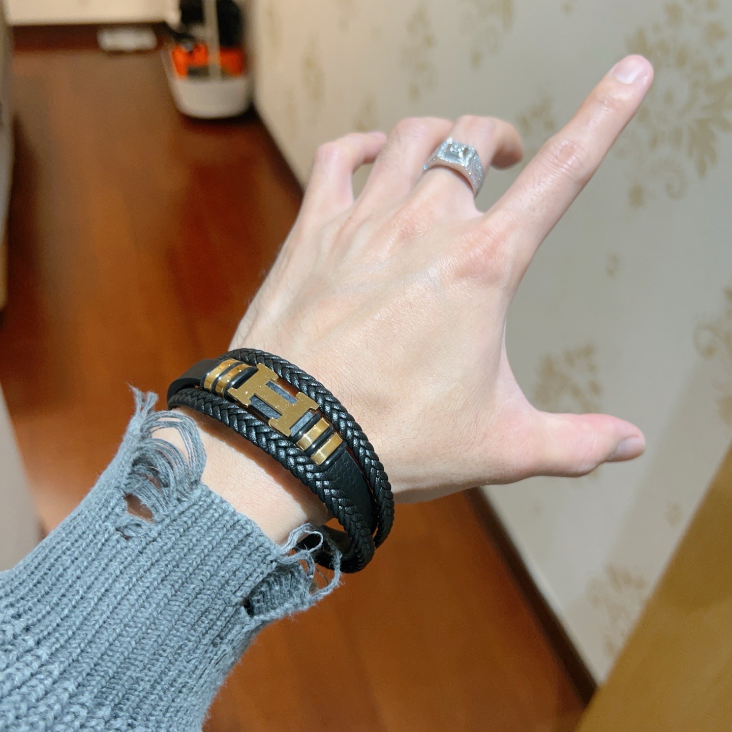 Bracciale Hermes New Anger Forest H Logo in pelle intrecciata nera hardware in metallo color oro 19 cm