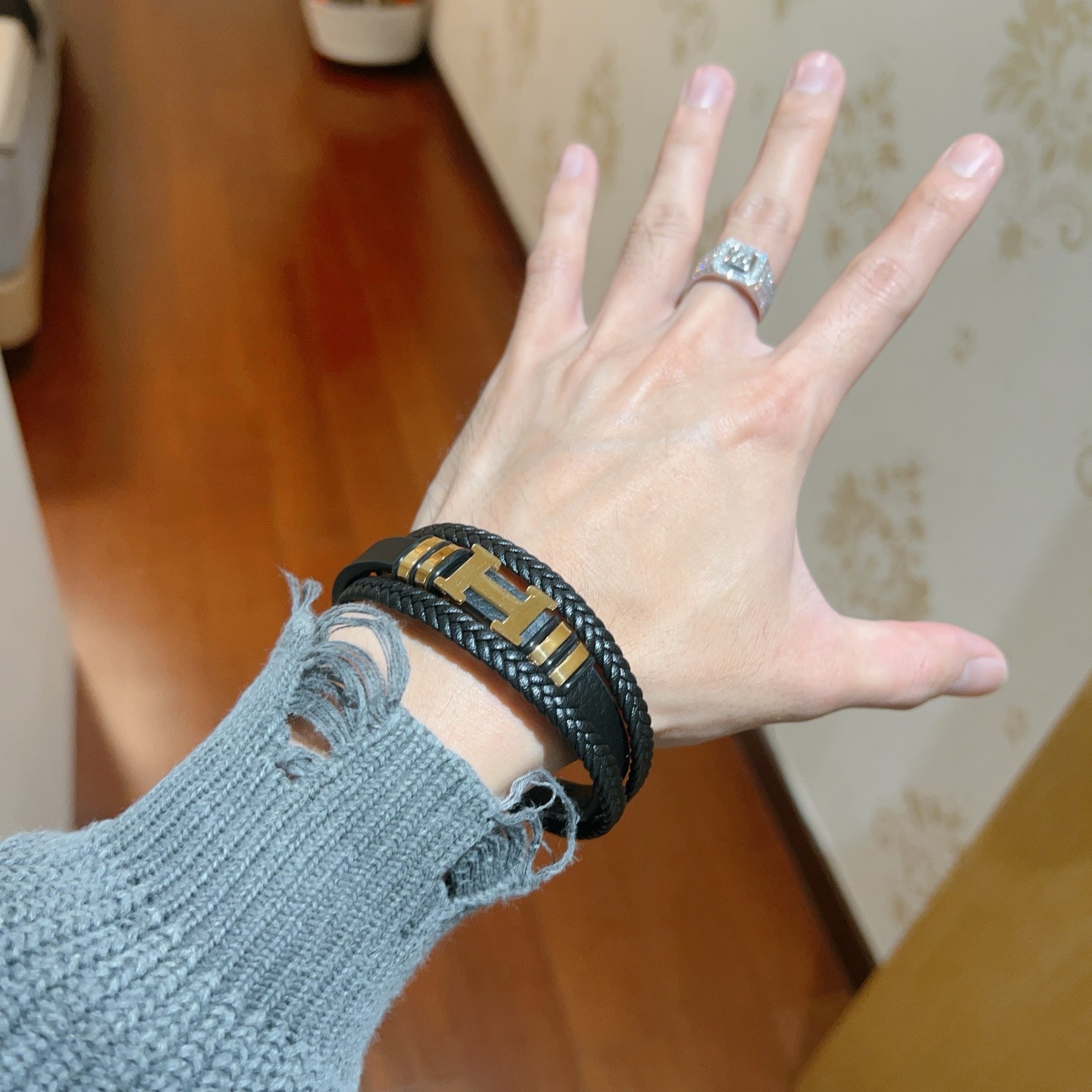 Bracciale Hermes New Anger Forest H Logo in pelle intrecciata nera hardware in metallo color oro 19 cm
