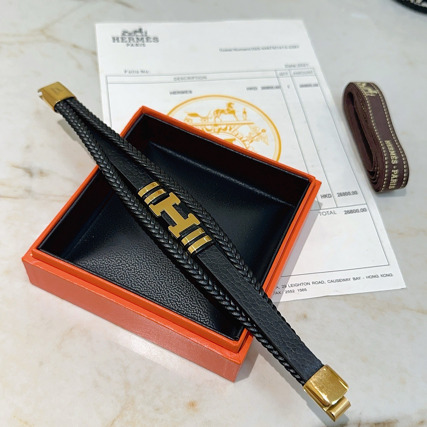 Bracciale Hermes New Anger Forest H Logo in pelle intrecciata nera hardware in metallo color oro 19 cm