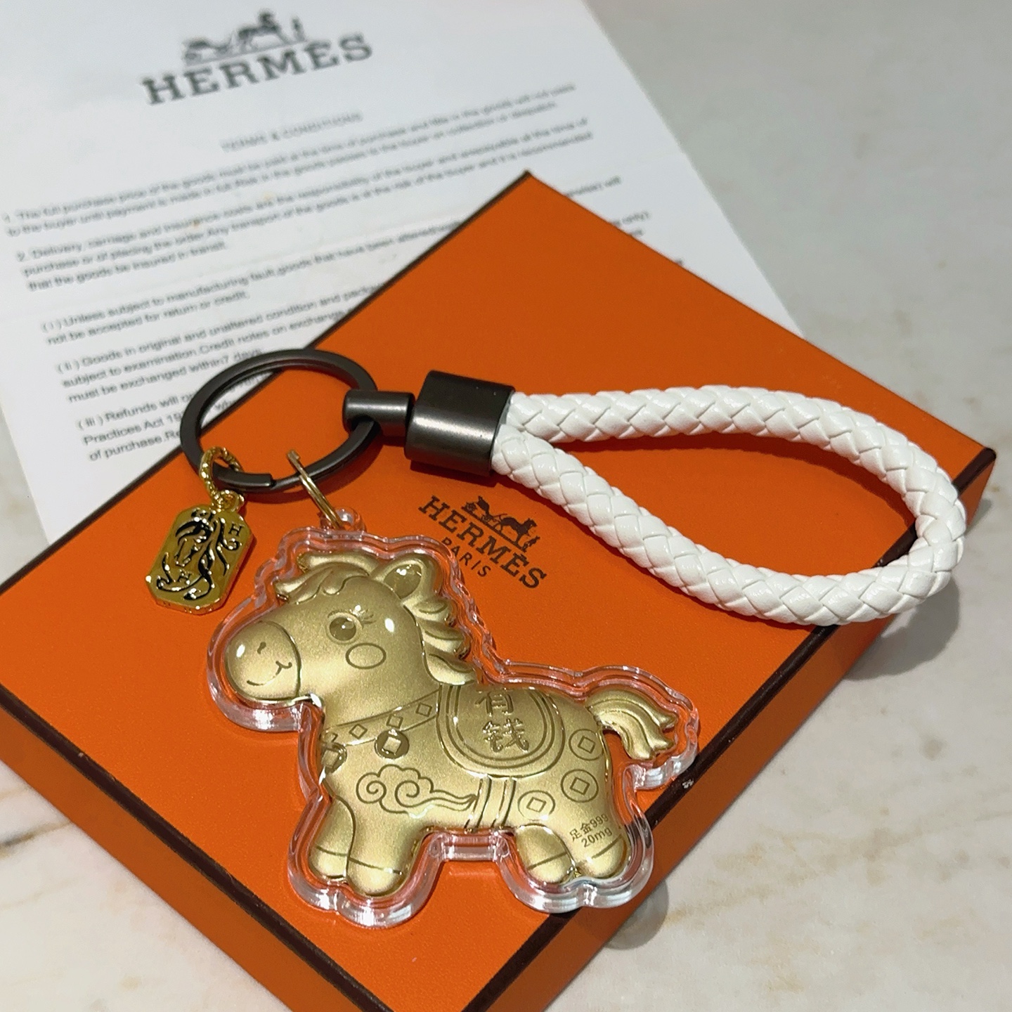 Ciondolo Hermes bianco nero oro 999 12 cm