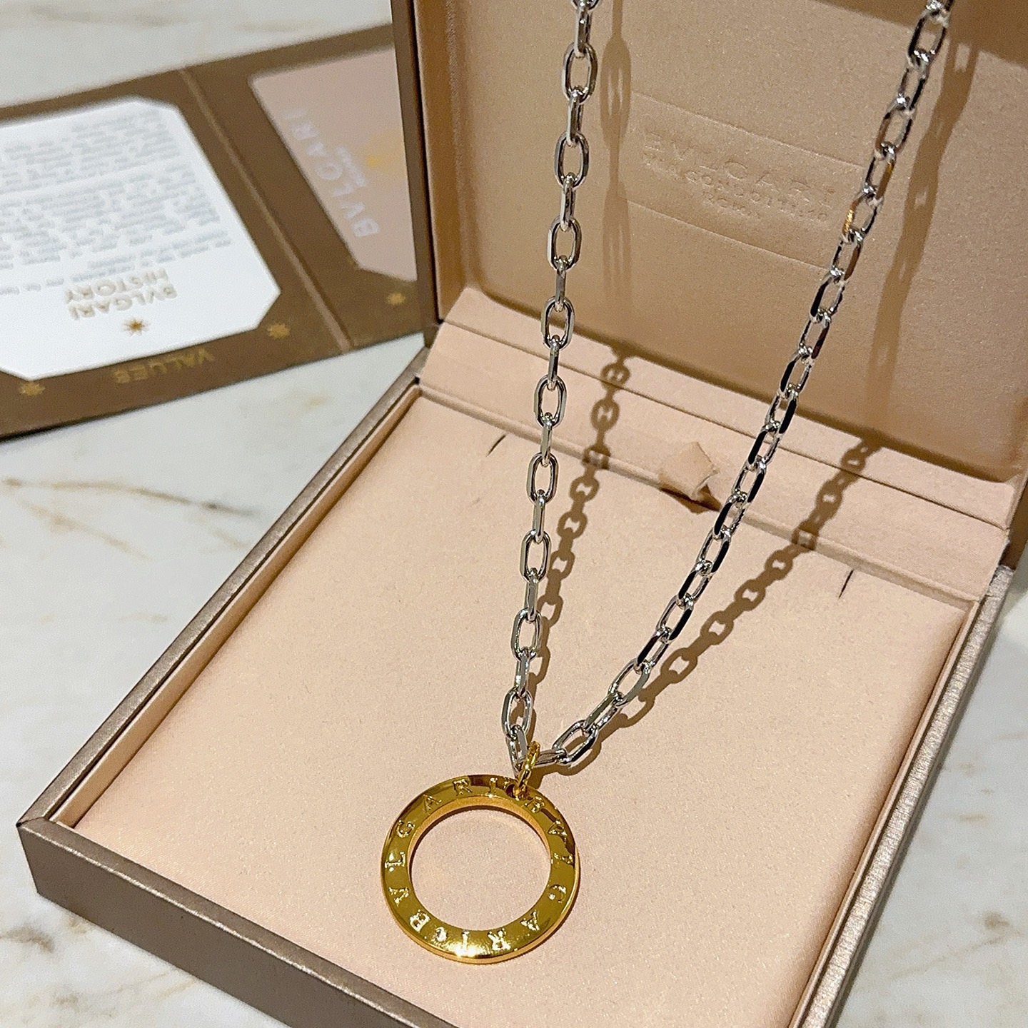 Bvlgari Bvlgari Bvlgari necklace Silver-toned chain gold-toned circular pendant no gemstones 60cm