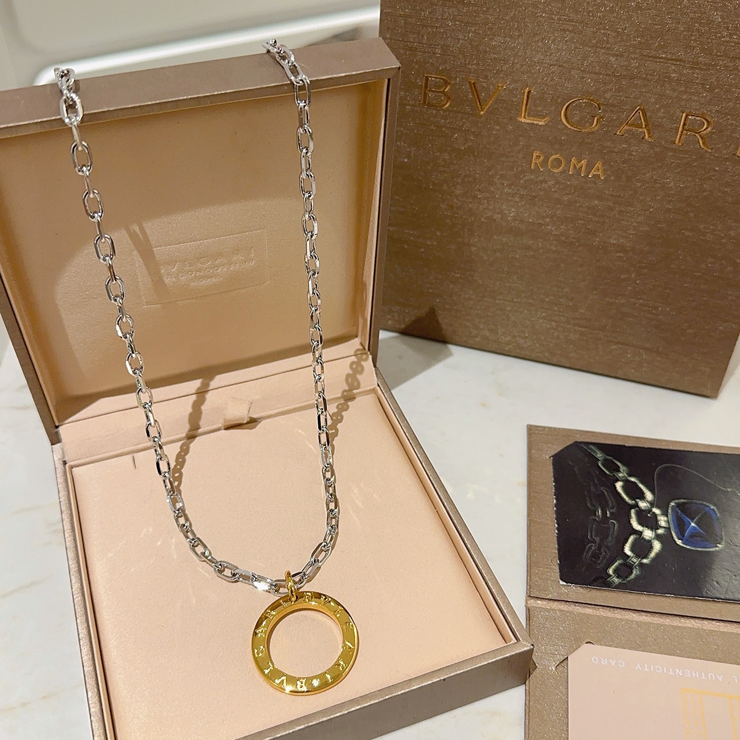 Bvlgari Bvlgari Bvlgari necklace Silver-toned chain gold-toned circular pendant no gemstones 60cm