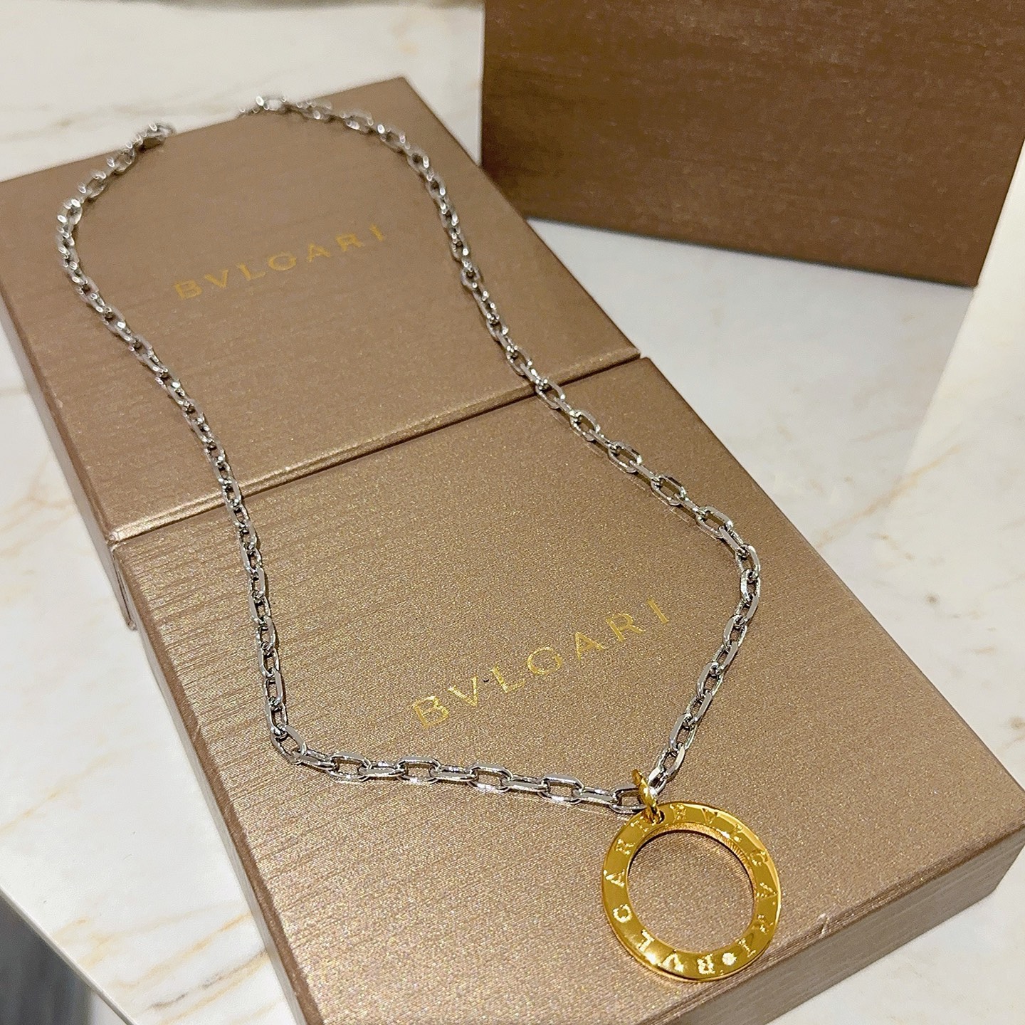 Bvlgari Bvlgari Bvlgari necklace Silver-toned chain gold-toned circular pendant no gemstones 60cm