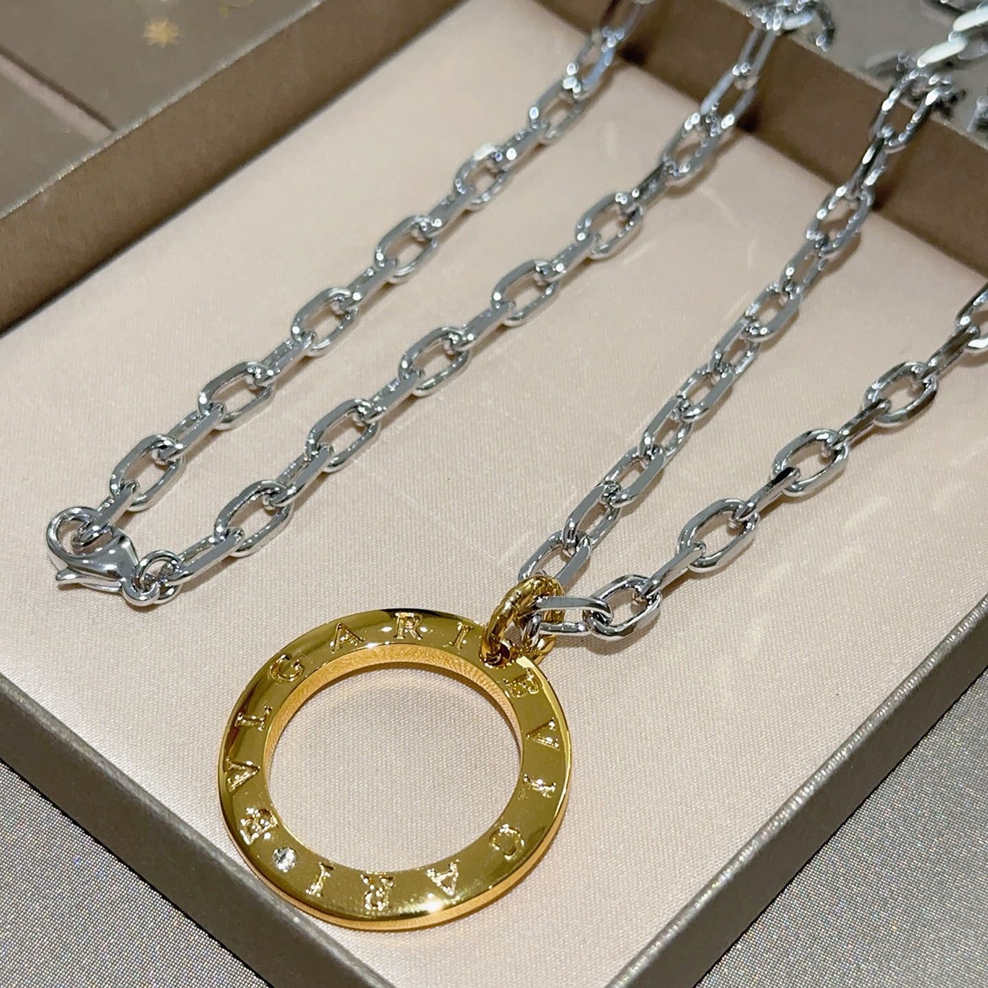 Bvlgari Bvlgari Bvlgari necklace Silver-toned chain gold-toned circular pendant no gemstones 60cm