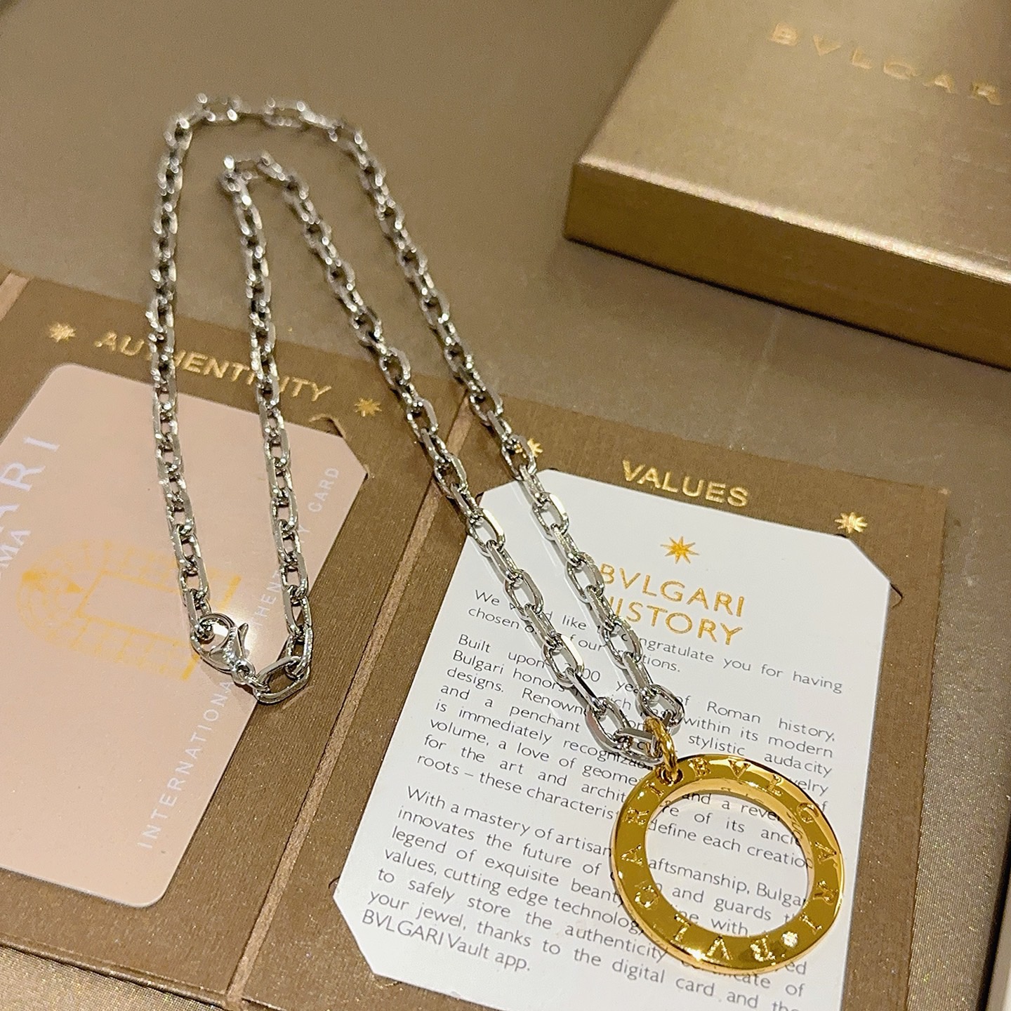 Bvlgari Bvlgari Bvlgari necklace Silver-toned chain gold-toned circular pendant no gemstones 60cm