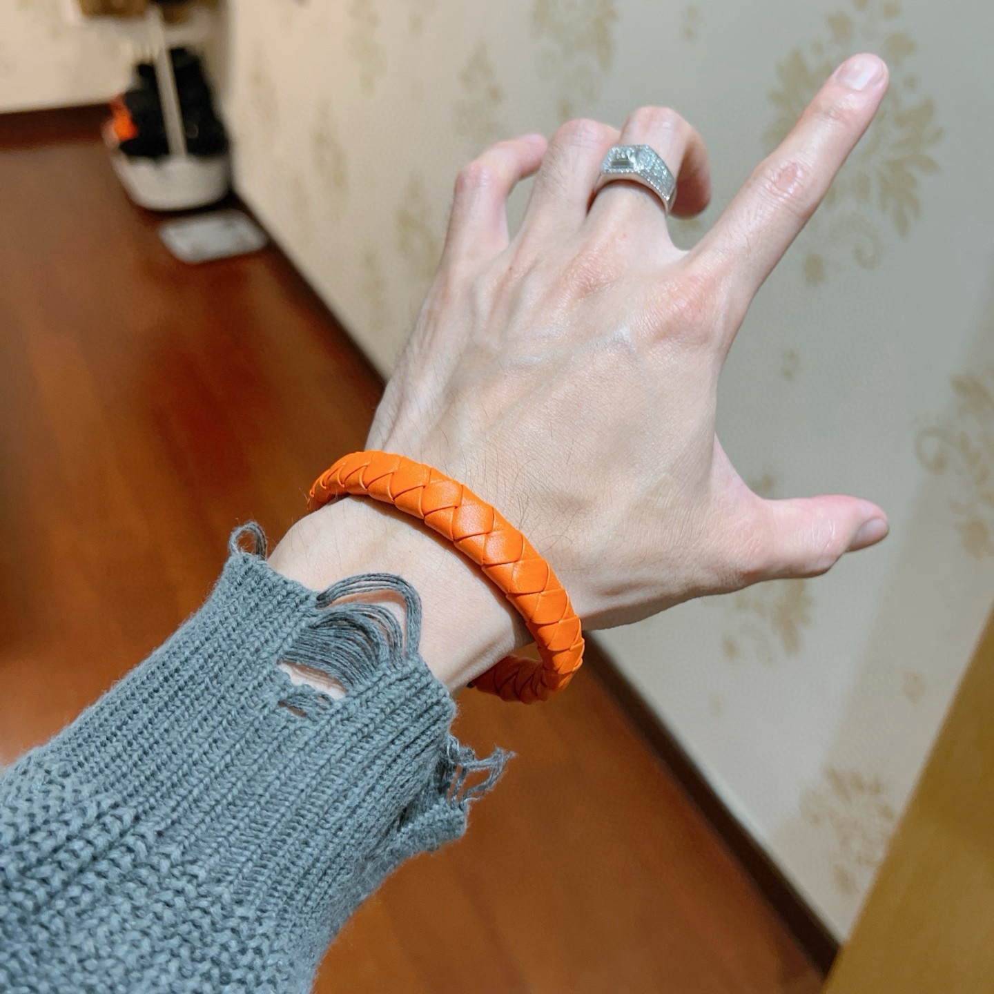 Bracciale Clic Clac in pelle intrecciata Hermes Bracciale in pelle intrecciata arancione con chiusura in metallo color canna di fucile nero 19 cm