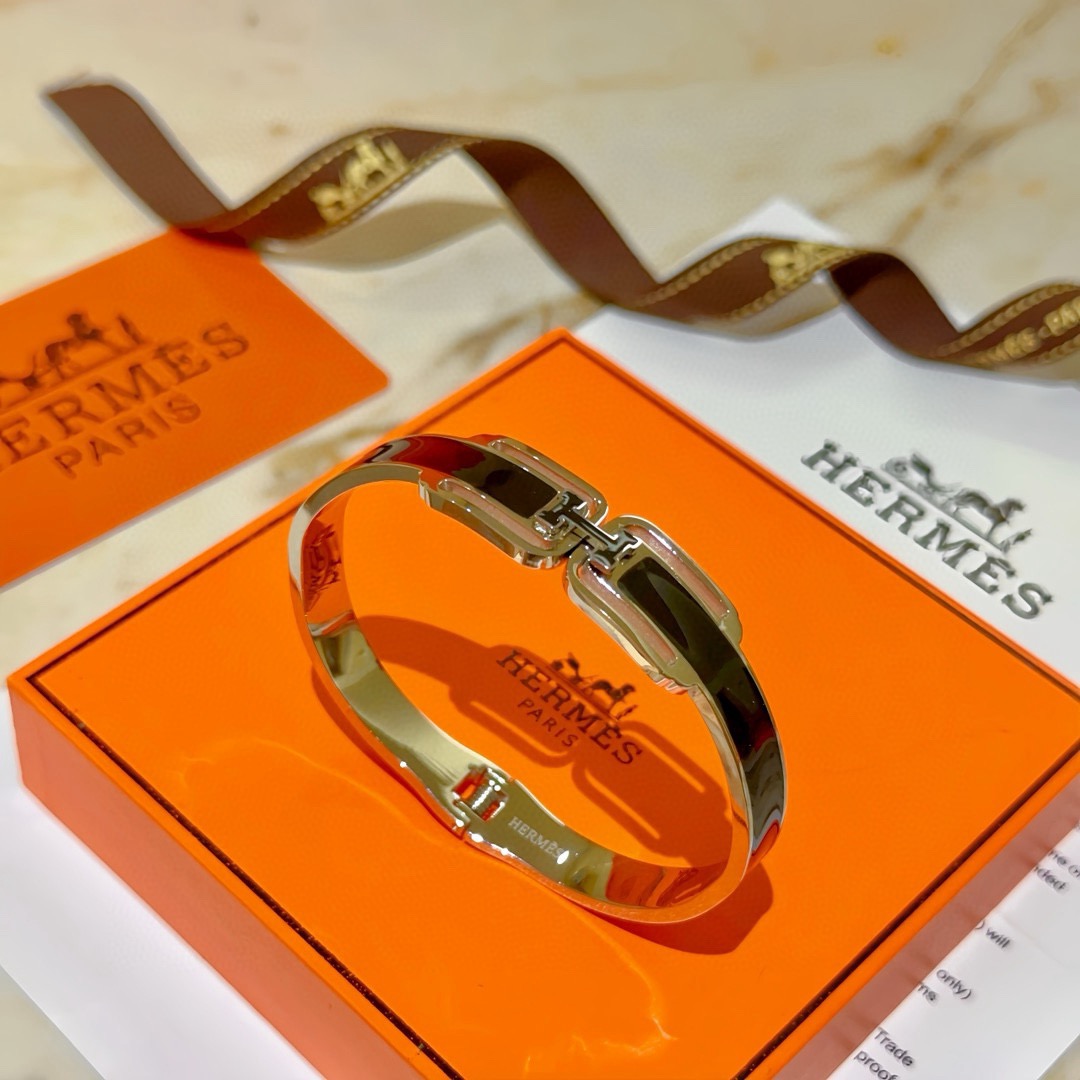 Bracciale Hermes Clic H in metallo argentato con smalto nero 17 cm