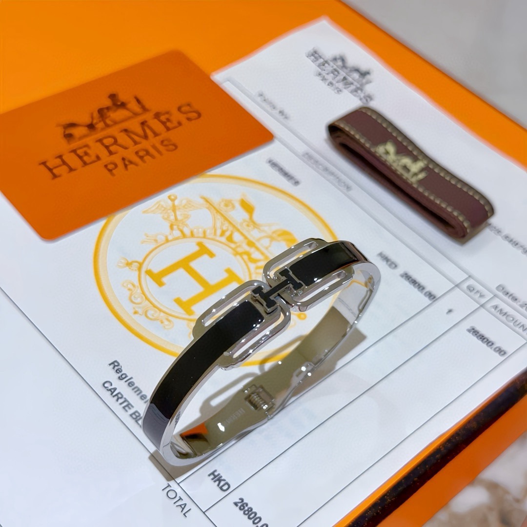 Bracciale Hermes Clic H in metallo argentato con smalto nero 17 cm