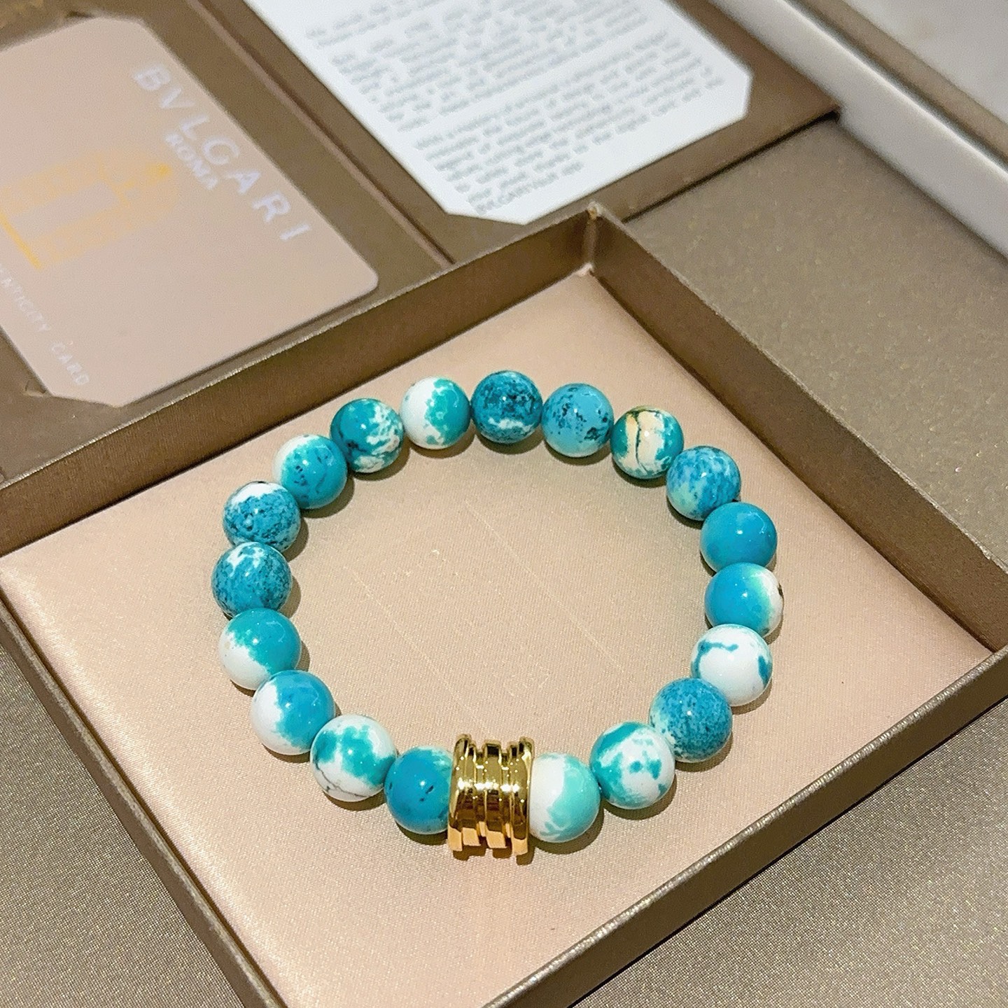Bvlgari DIVAS DREAM bracelet yellow gold with turquoise and white marbled beads 18