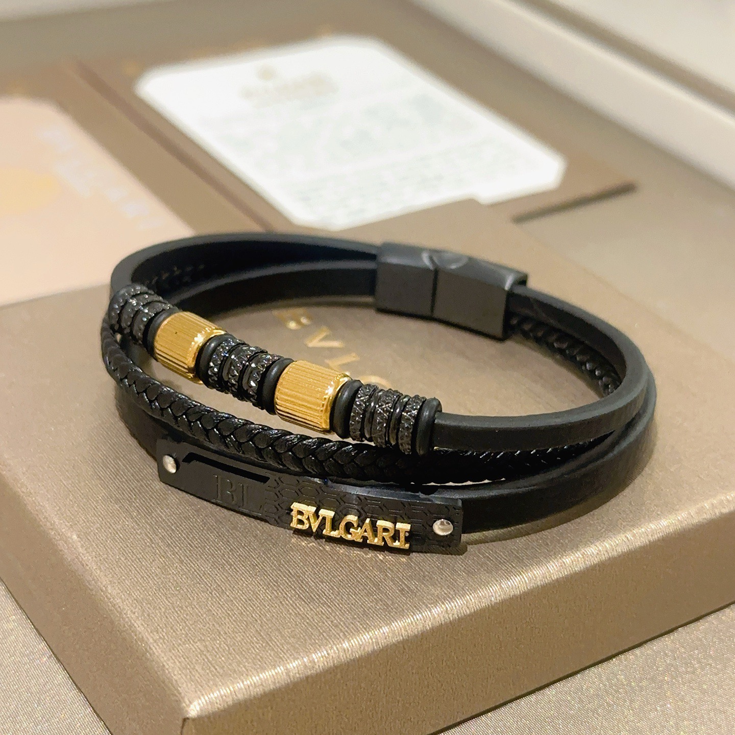 Bvlgari Serpenti Forever bracelet Black leather with gold-tone metal accents and black pave stone details 19cm