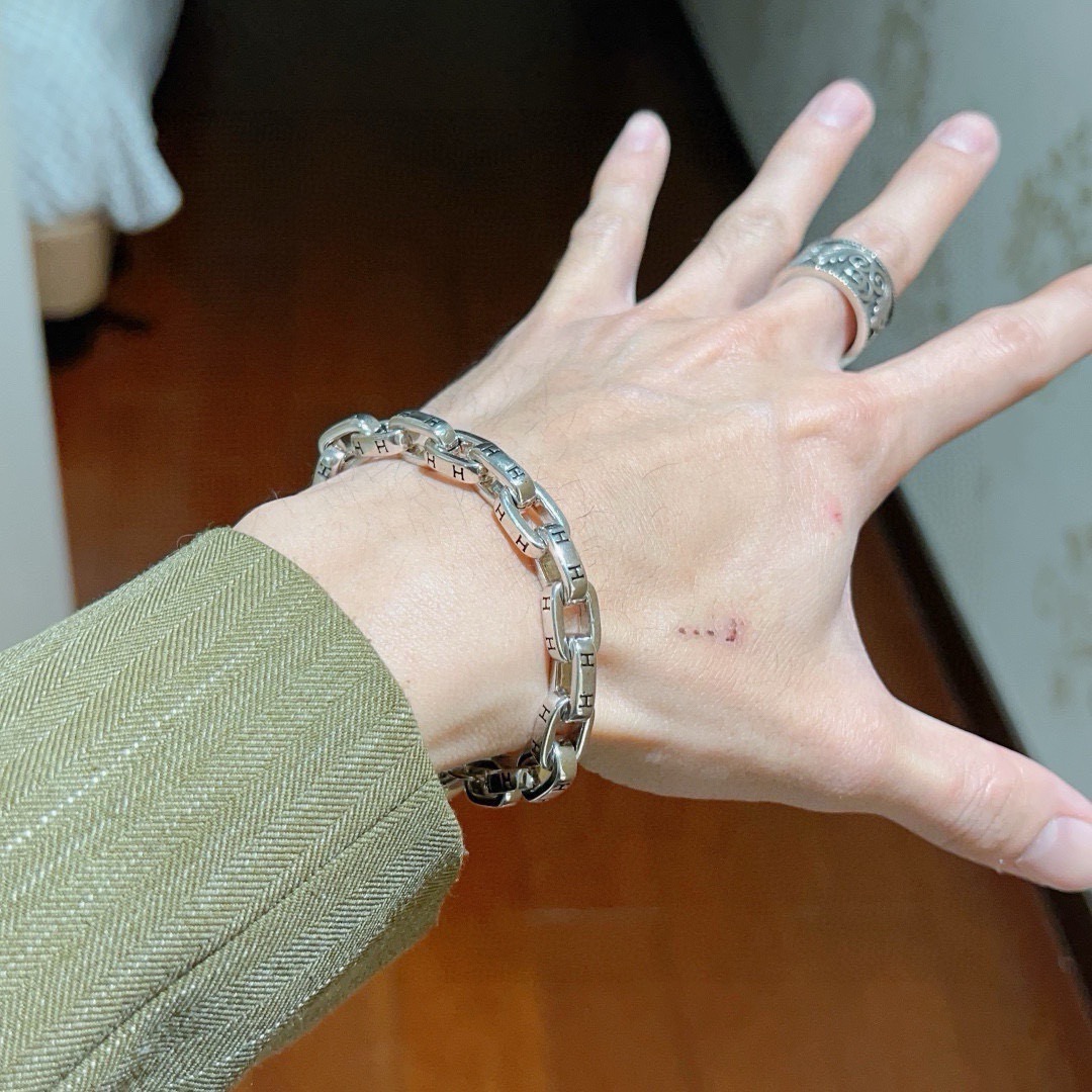 Hermes Chaine d Ancre H inciso braccialetto a catena toggle bracciale in metallo argentato con dettagli H neri incisi 19 cm