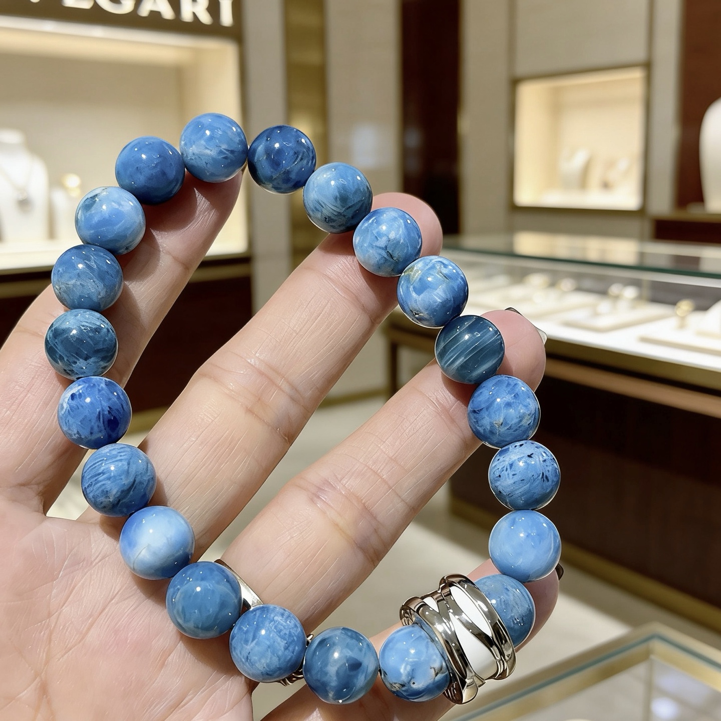 Bvlgari DIVAS DREAM bracelet Silver-toned metal with white enamel accent variegated blue stone beads 20