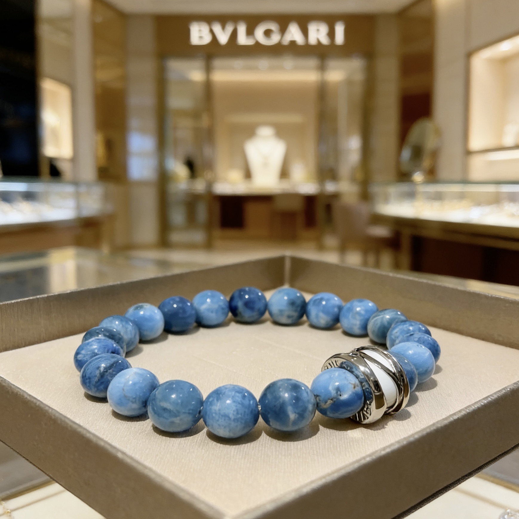 Bvlgari DIVAS DREAM bracelet Silver-toned metal with white enamel accent variegated blue stone beads 20