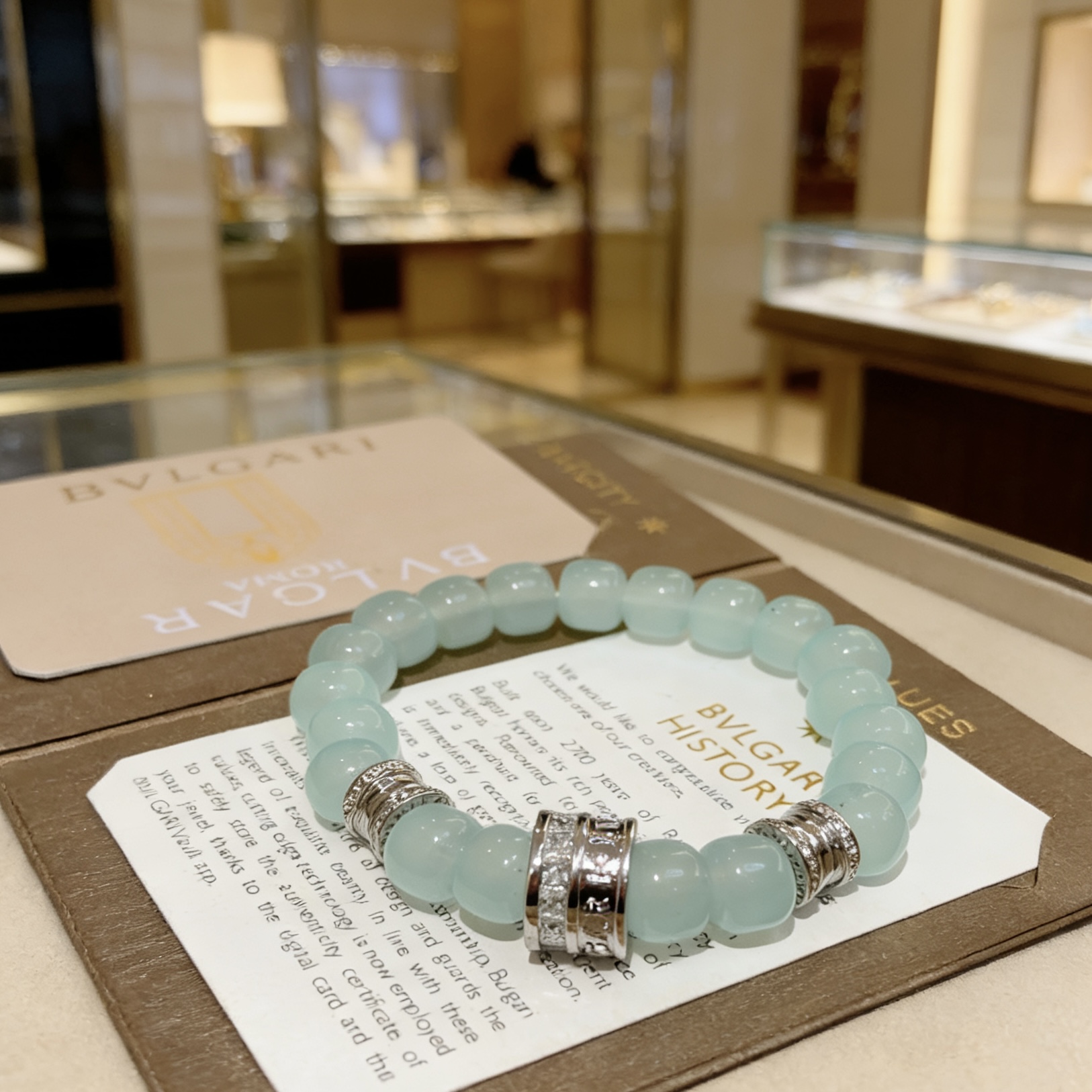 Bvlgari B zero1 bracelet Silver-toned metal with pale aqua blue beads and clear diamond accents 18cm