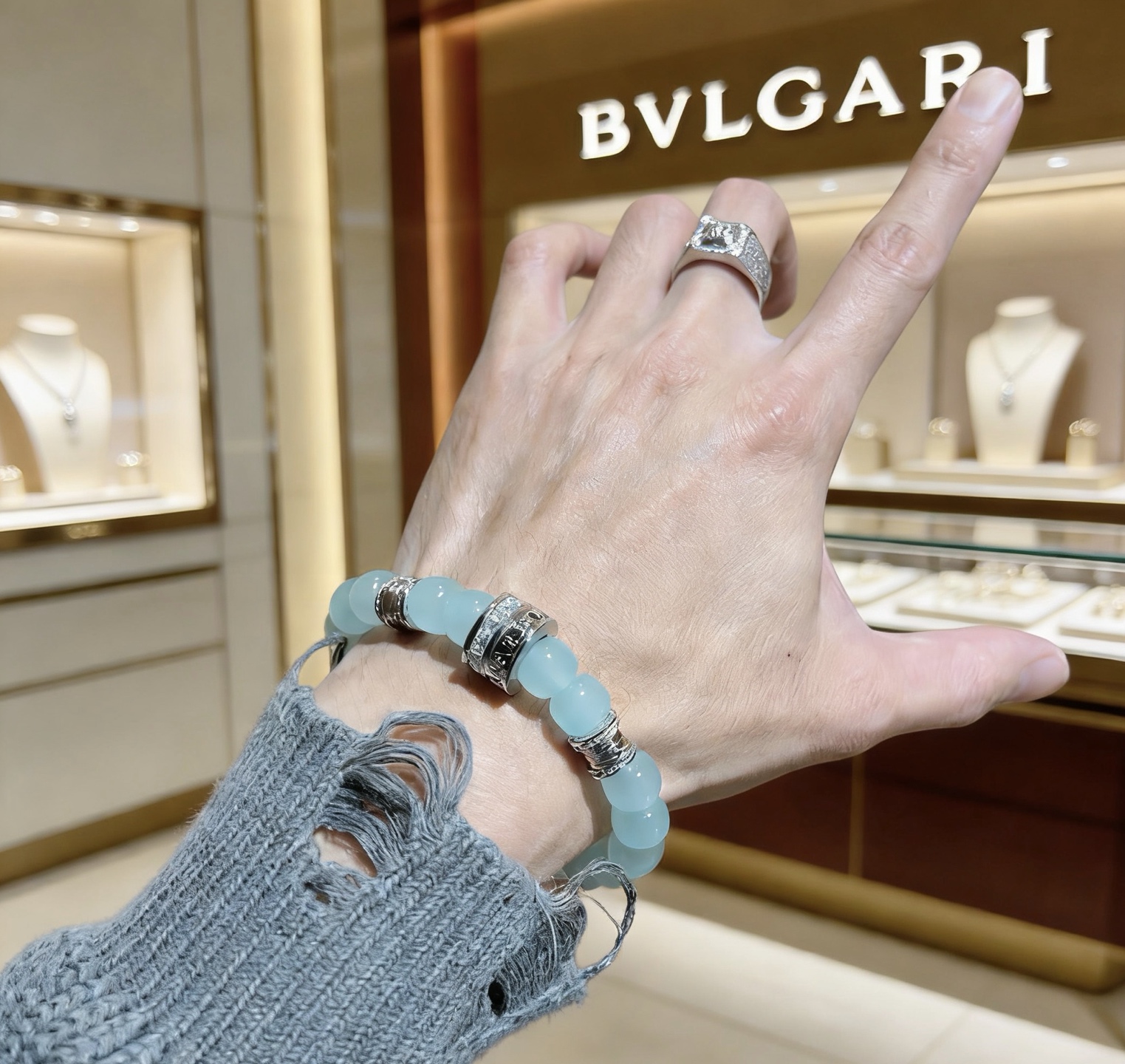 Bvlgari B zero1 bracelet Silver-toned metal with pale aqua blue beads and clear diamond accents 18cm