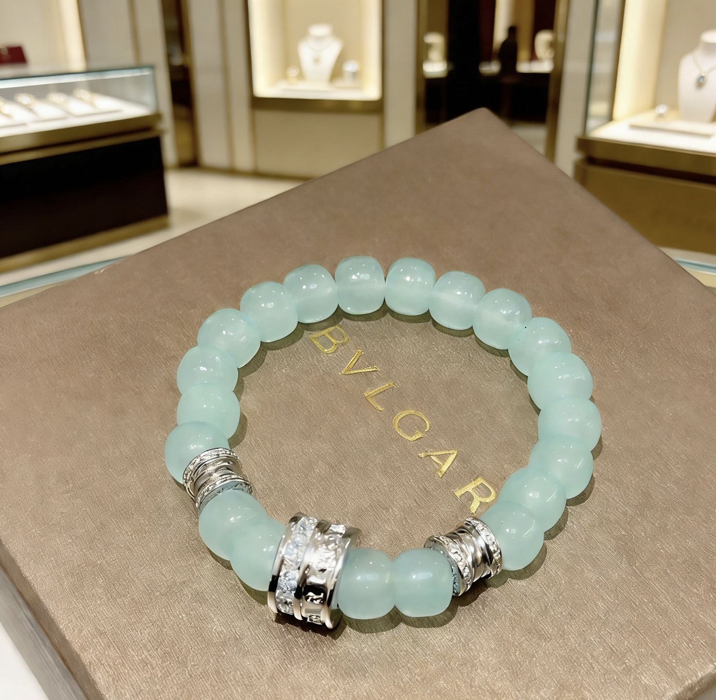 Bvlgari B zero1 bracelet Silver-toned metal with pale aqua blue beads and clear diamond accents 18cm