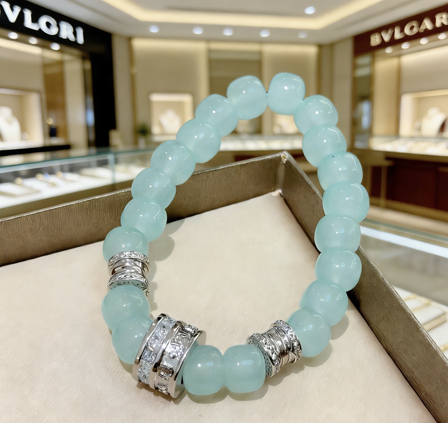 Bvlgari B zero1 bracelet Silver-toned metal with pale aqua blue beads and clear diamond accents 18cm