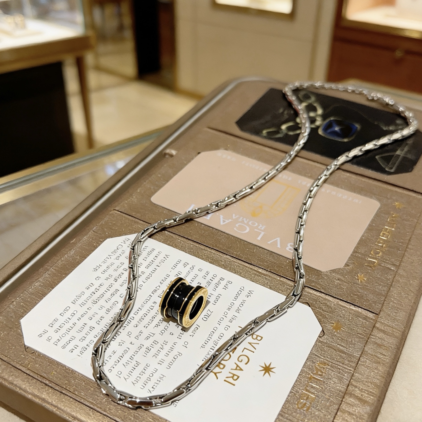 Bvlgari B zero1 necklace silver-toned stainless steel yellow gold accents black ceramic 60cm