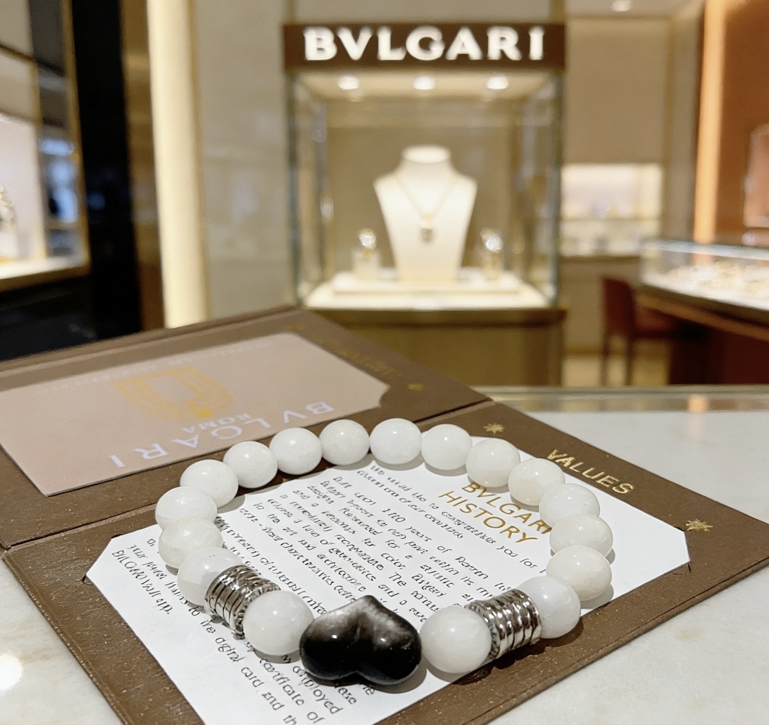 Bvlgari DIVAS DREAM bracelet silver-toned metal with white beads and black heart charm 18