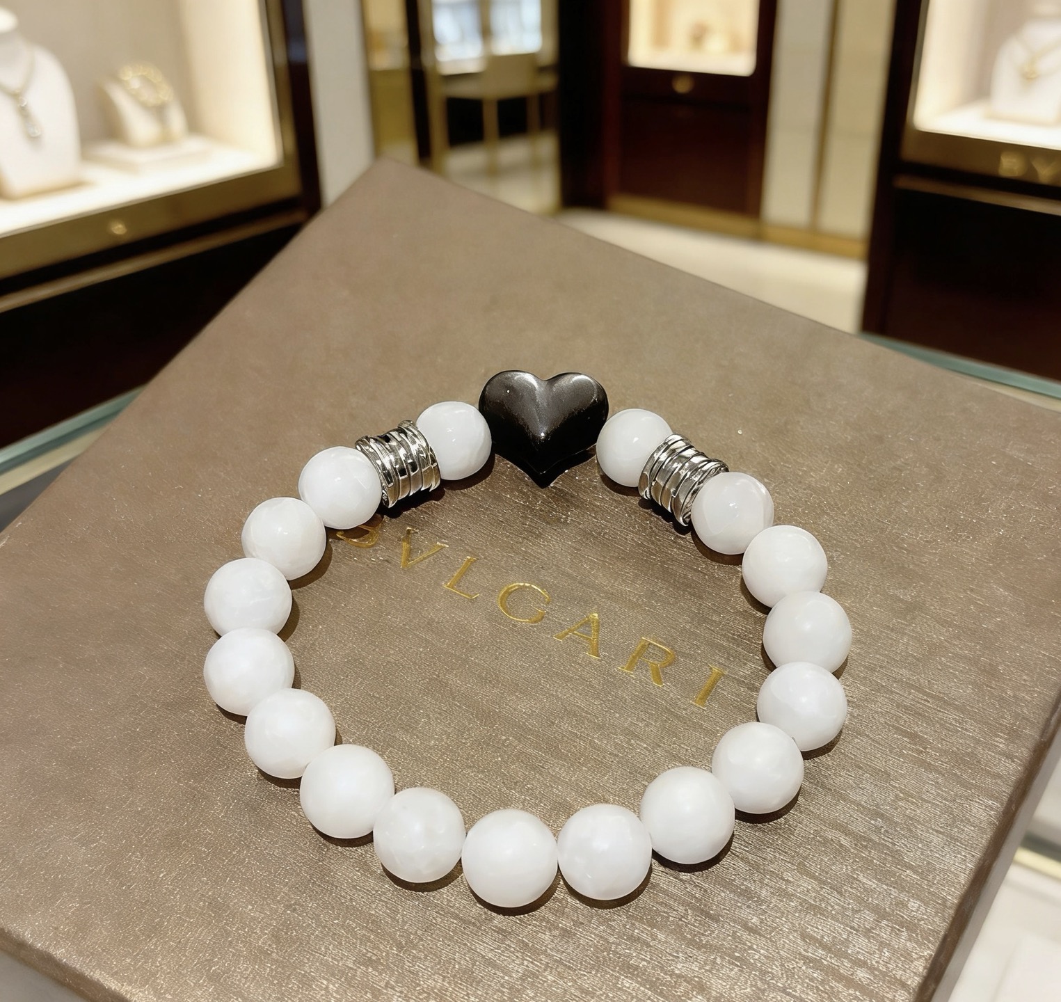 Bvlgari DIVAS DREAM bracelet silver-toned metal with white beads and black heart charm 18