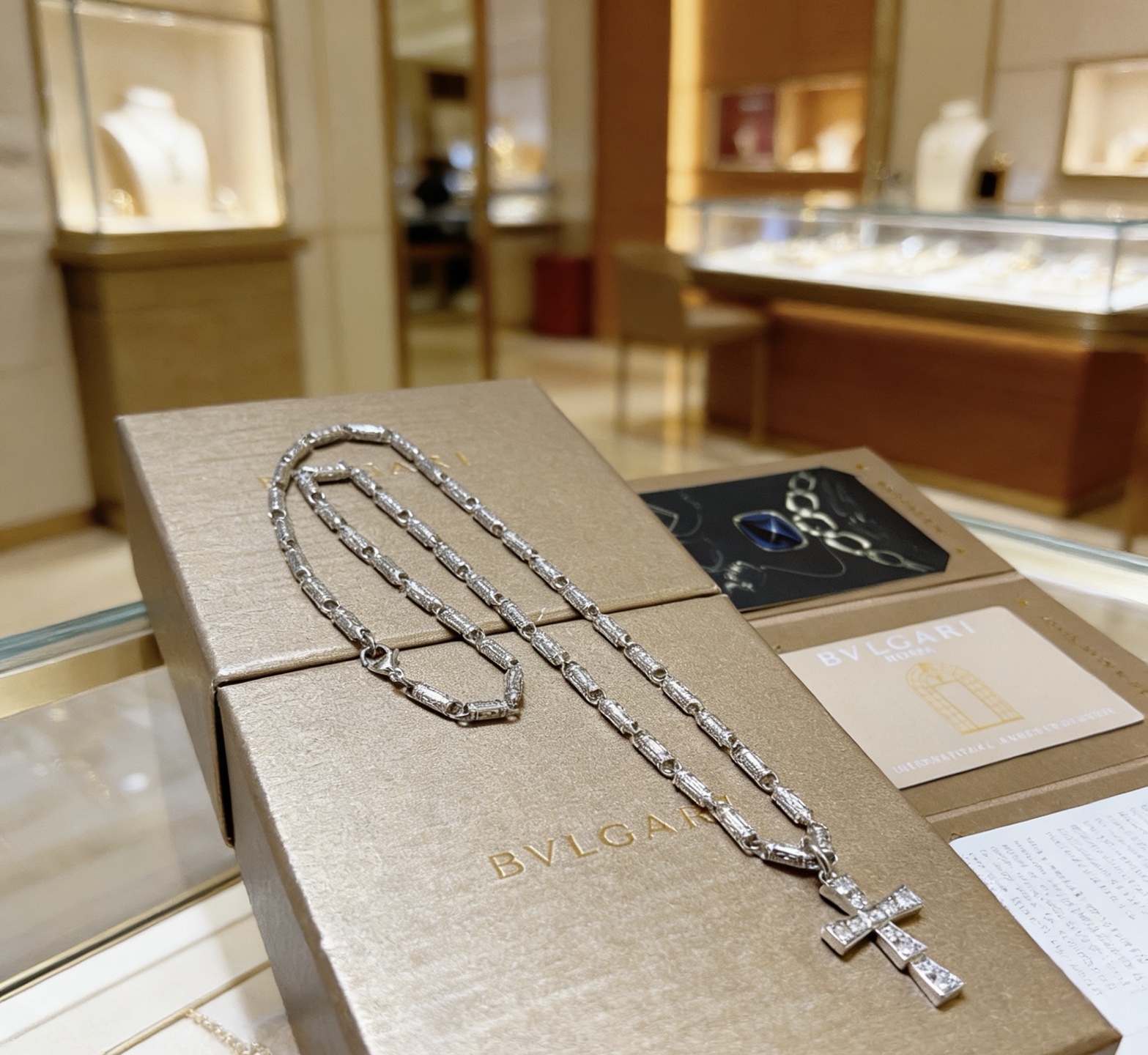 Bvlgari Serpenti Cross Pendant necklace 18K white gold with diamond accents 60cm