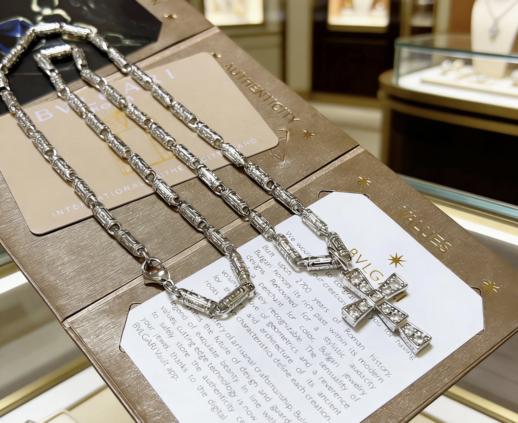 Bvlgari Serpenti Cross Pendant necklace 18K white gold with diamond accents 60cm