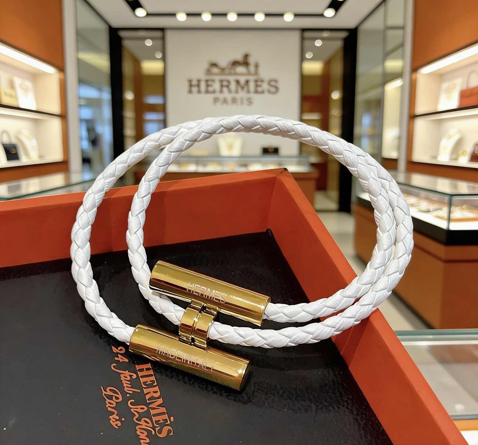 Bracciale Hermes Tournis Tresse Pelle intrecciata bianca con hardware in metallo color oro T2 17 cm