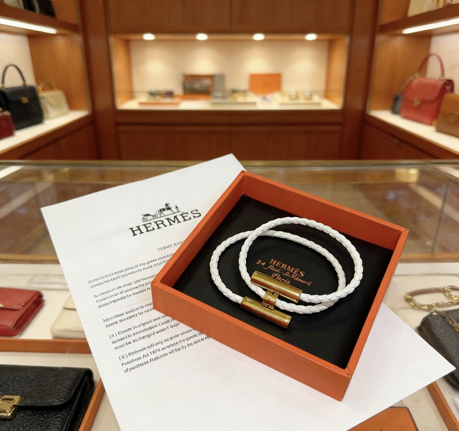 Bracciale Hermes Tournis Tresse Pelle intrecciata bianca con hardware in metallo color oro T2 17 cm
