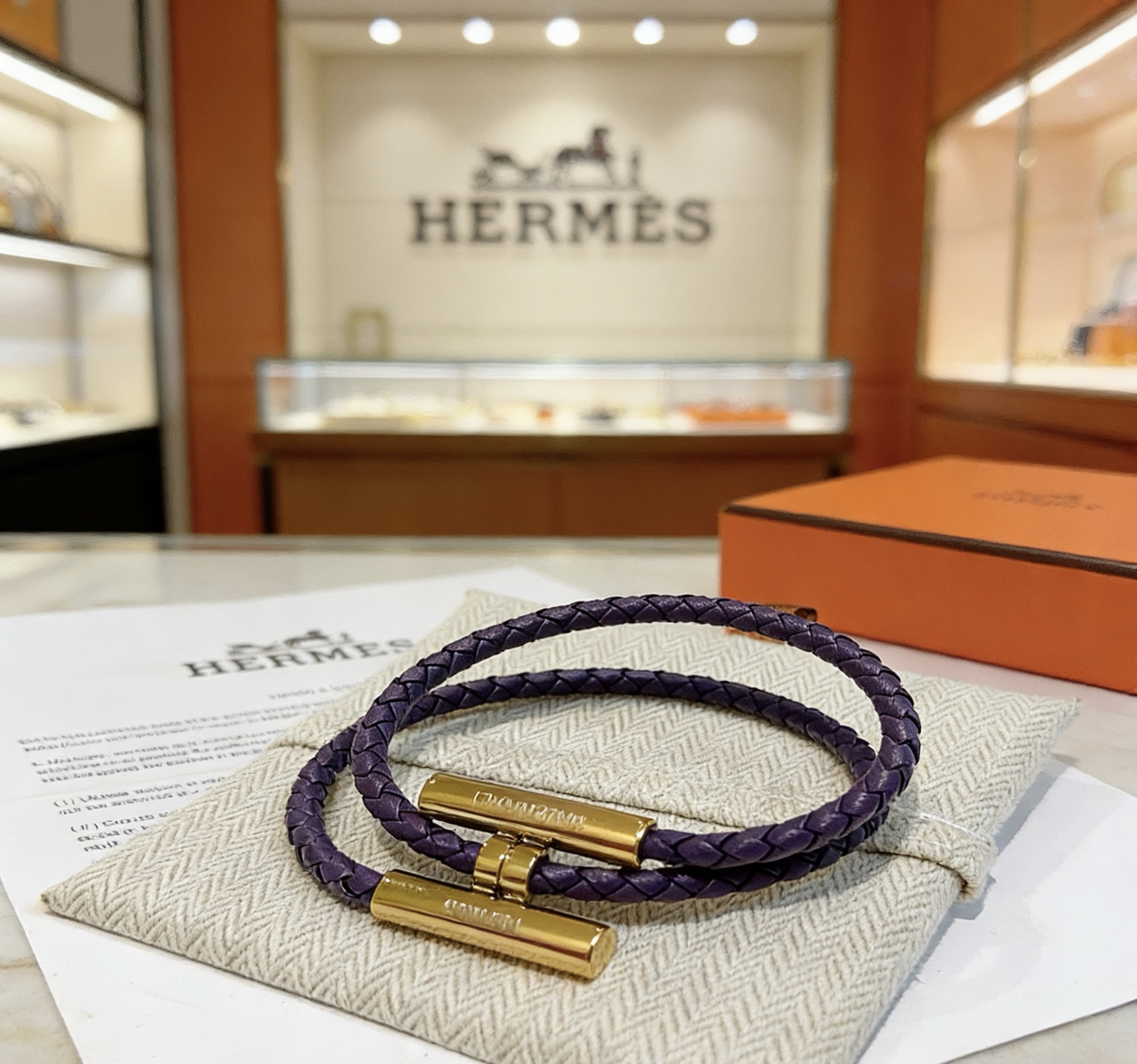 Bracelet Hermes Tournis Tresse Cuir tressé violet avec garniture en métal doré T3 19cm double tour