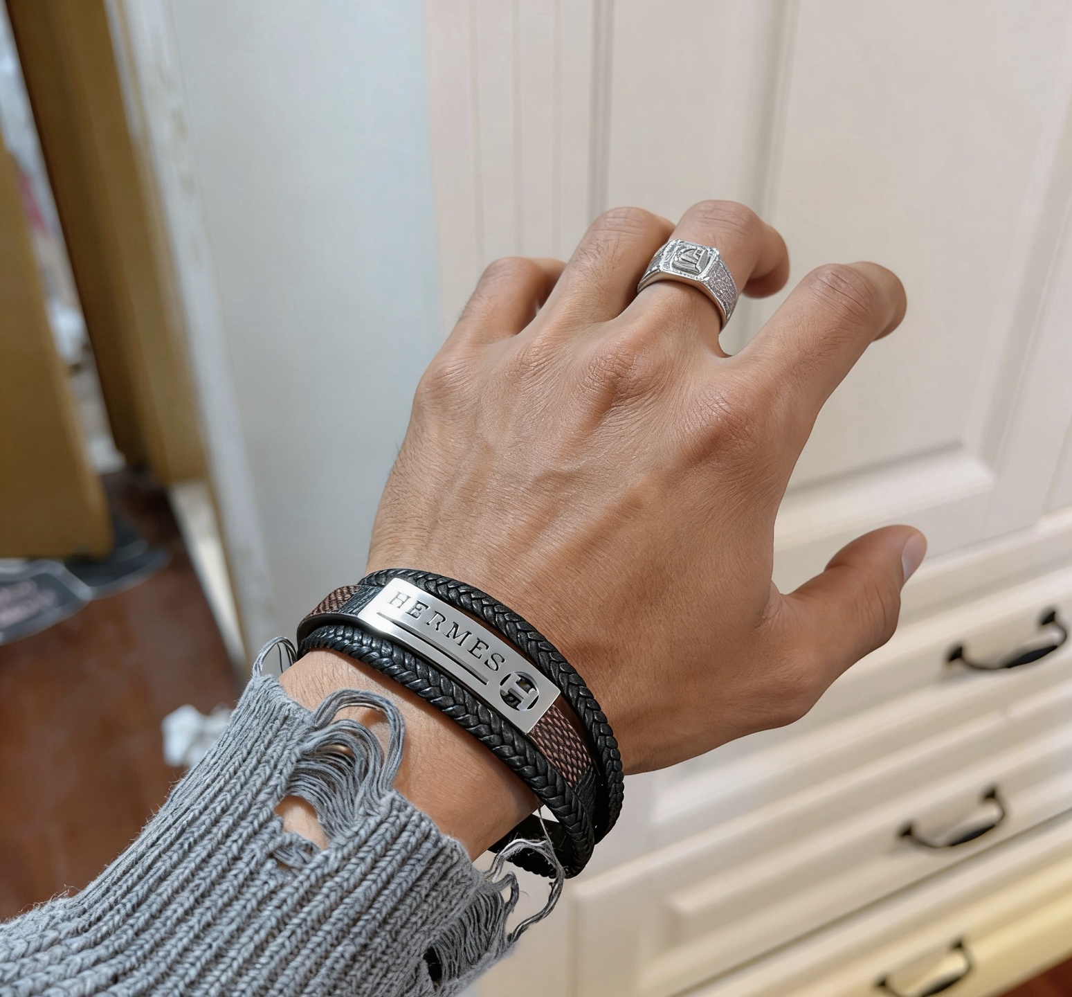 Bracciale Hermes H Tournis Tresse Pelle intrecciata nera Pelle marrone Hardware in metallo color argento palladio 19 cm