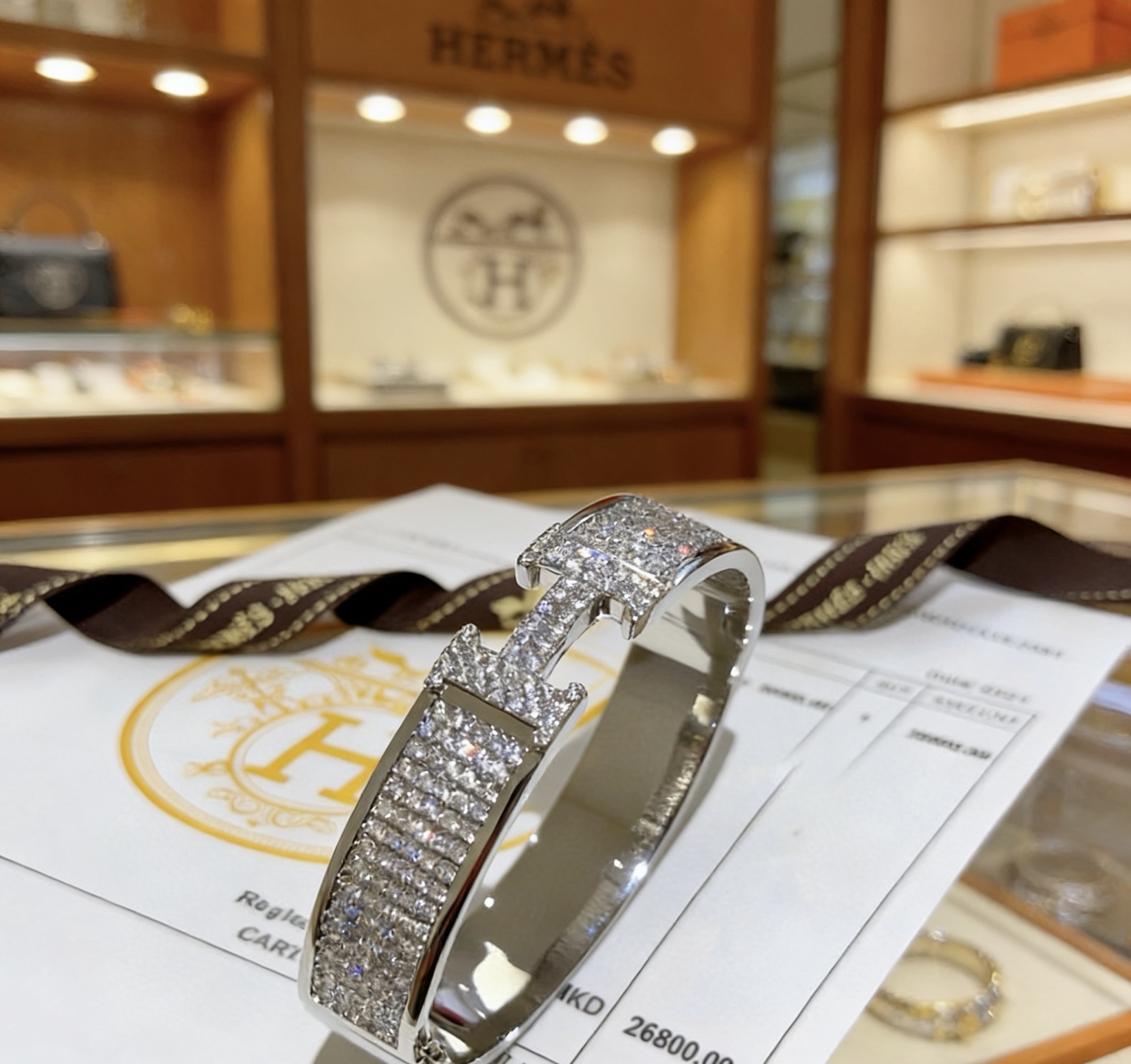 Bracciale Hermes Clic H in metallo argentato con diamanti trasparenti full-pave di 17 cm
