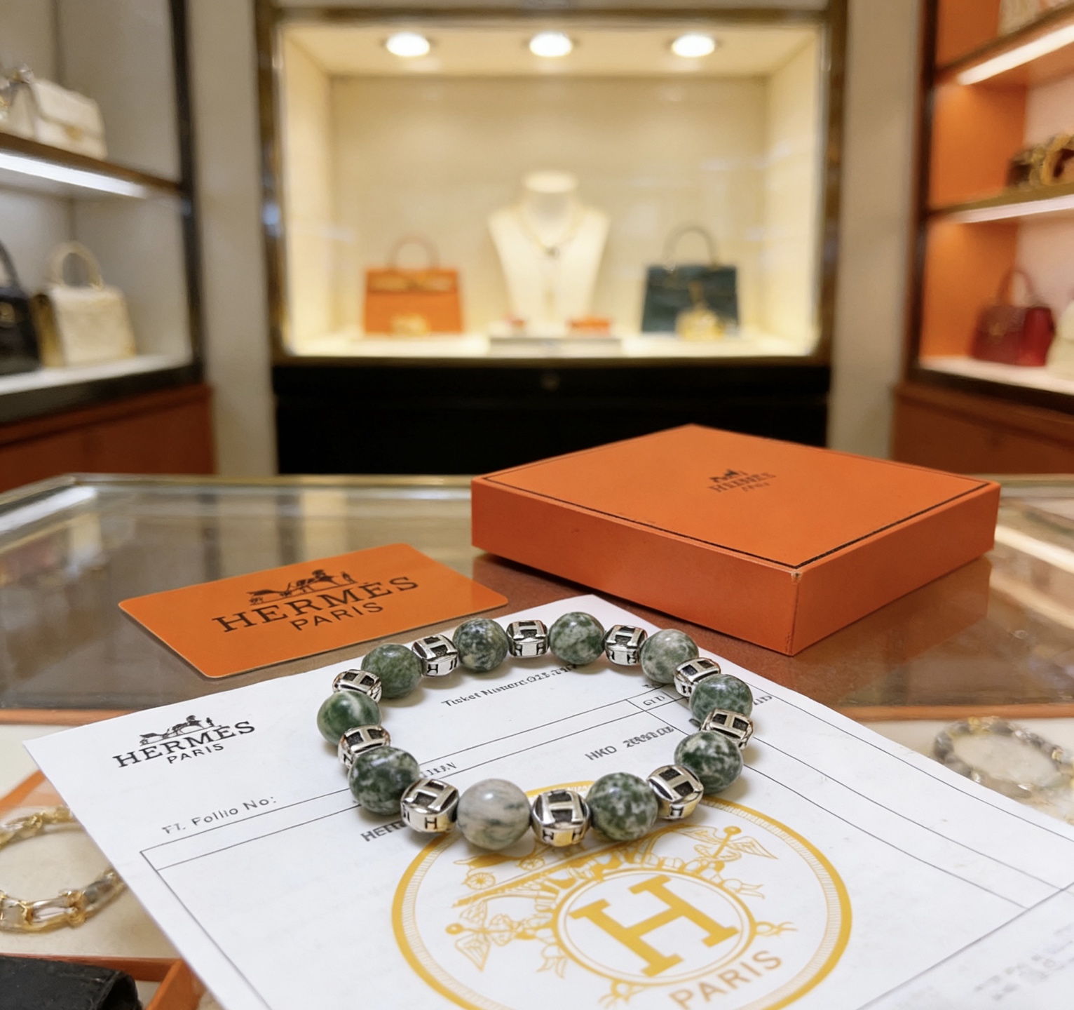 Bracciale Hermes Anger Forest in metallo argentato con perle di pietra naturale maculata verde 18 cm