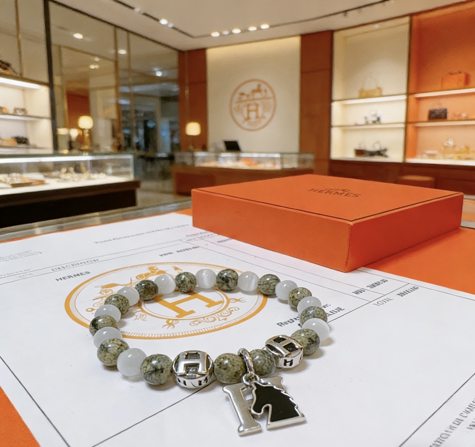 Bracciale Hermes Anger Forest metallo tono argento serpentino verde calcedonio bianco smalto nero 18 cm