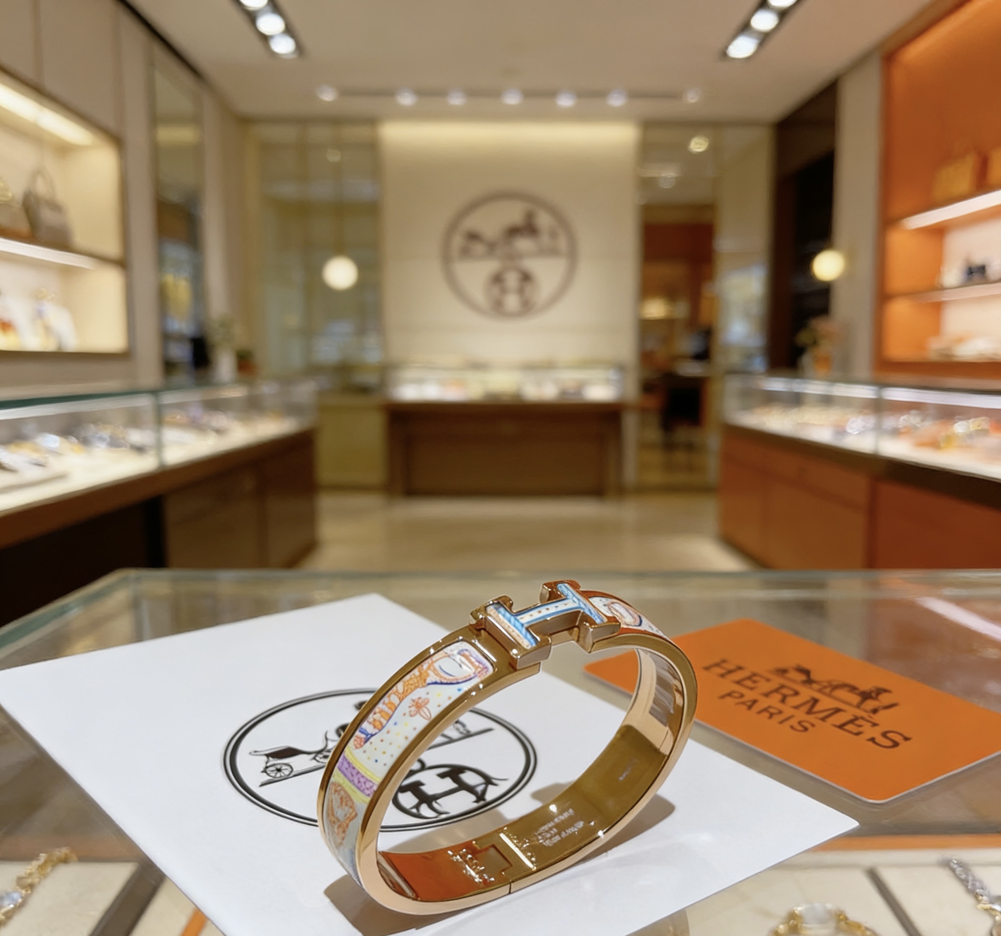 Bracciale Hermes Clic H in metallo oro rosa con smalto stampato multicolor pastello 17 cm