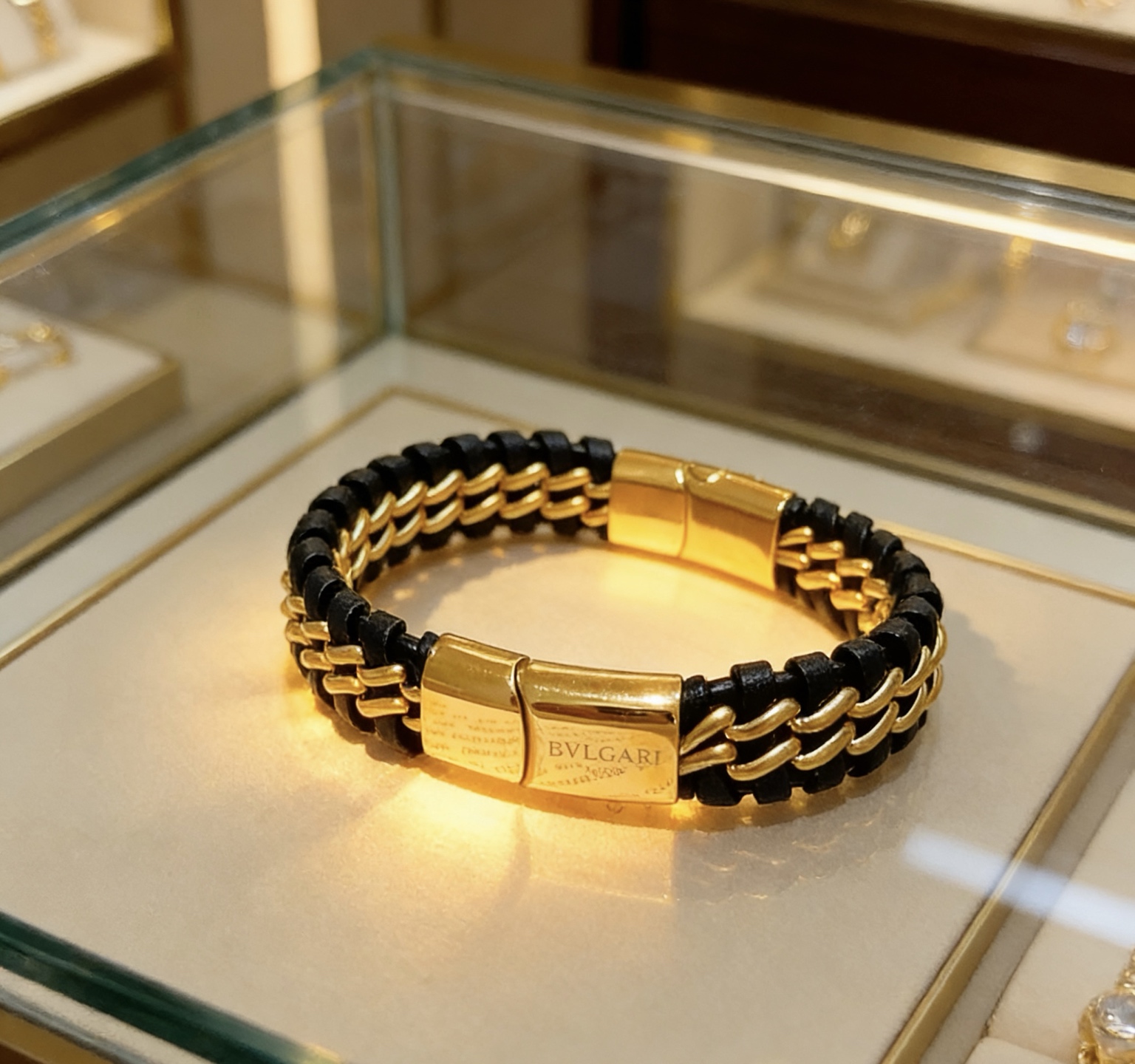 Bvlgari B zero1 bracelet Yellow gold tone metal with black woven leather 19cm
