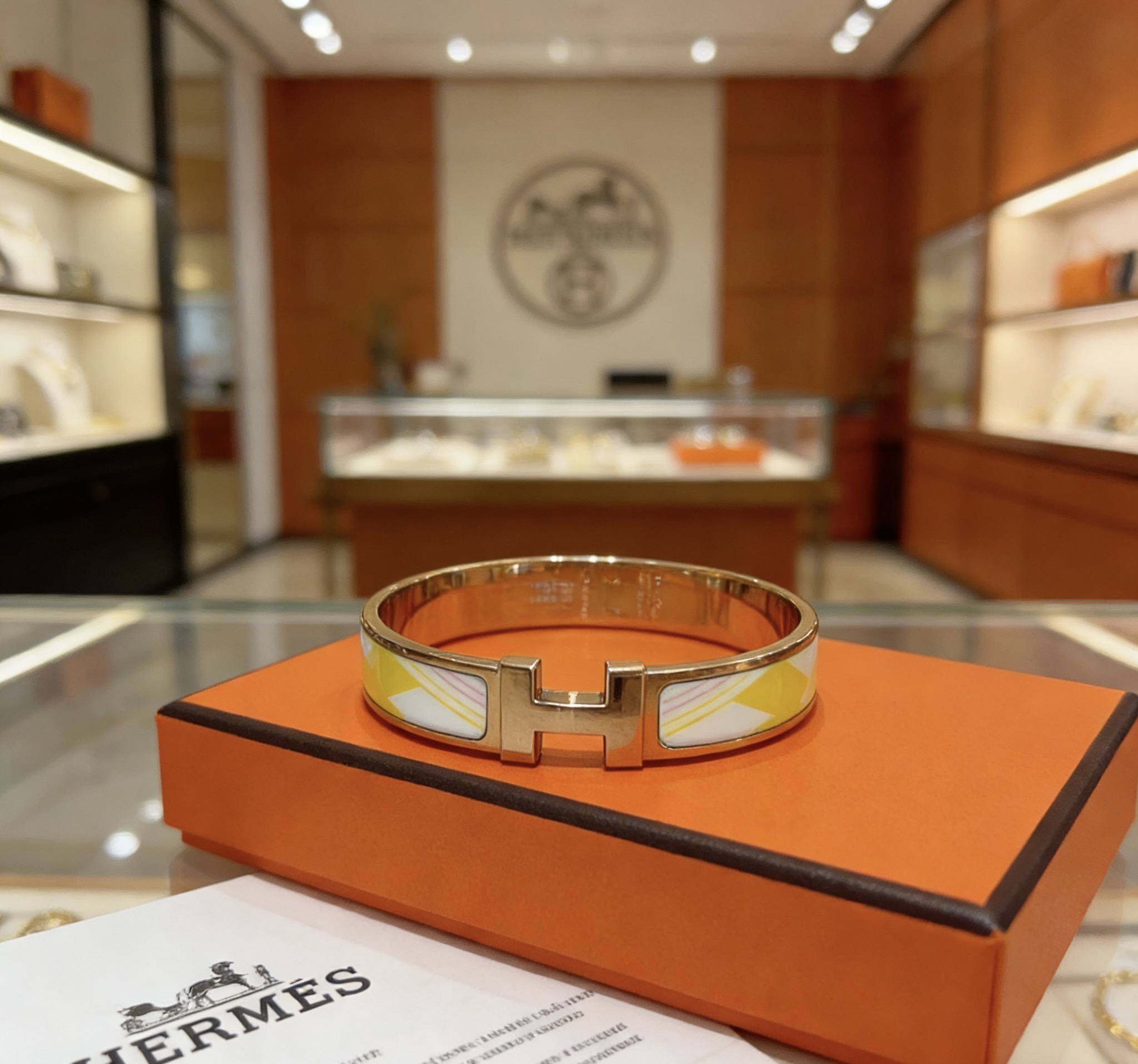 Bracciale Hermes Clic H metallo placcato oro rosa con smalto giallo bianco viola chiaro 17