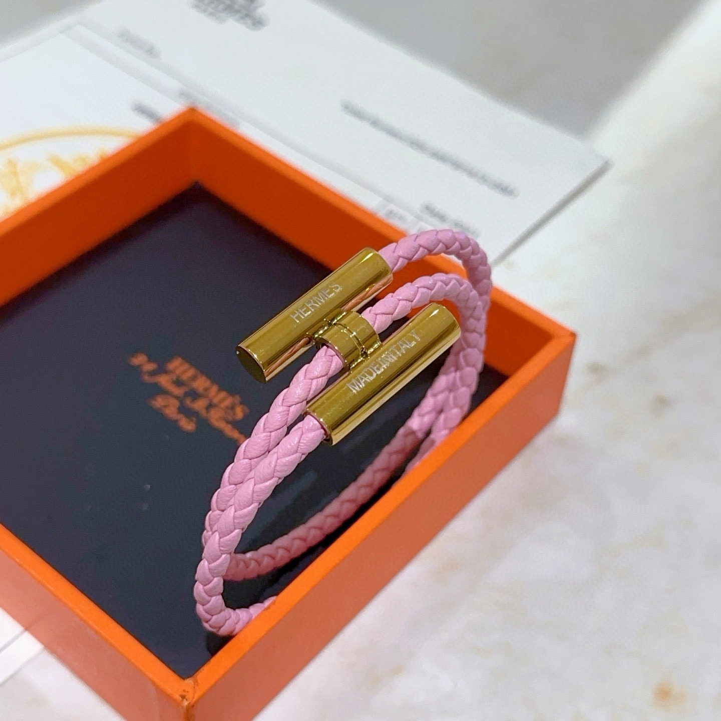 Bracciale Hermes Tournis Tresse Pelle intrecciata rosa con hardware placcato oro T2 17 cm