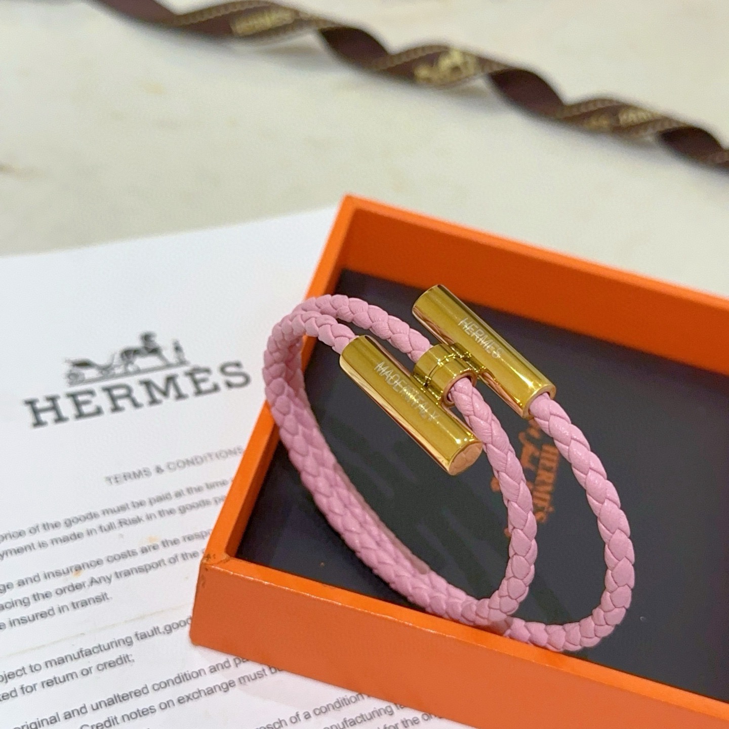 Bracciale Hermes Tournis Tresse Pelle intrecciata rosa con hardware placcato oro T2 17 cm