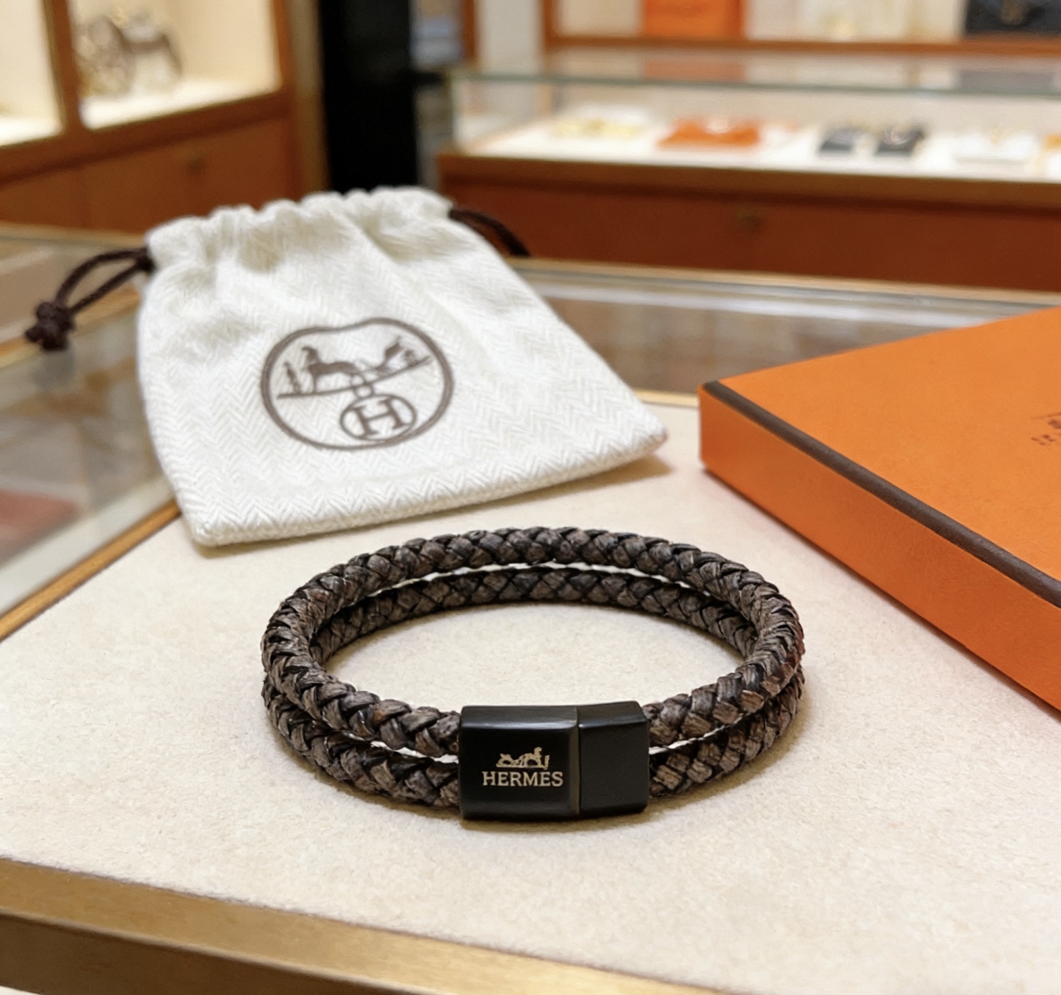 Bracciale Hermes Tournis Tresse chiusura in metallo nero opaco pelle intrecciata grigio scuro 19 cm
