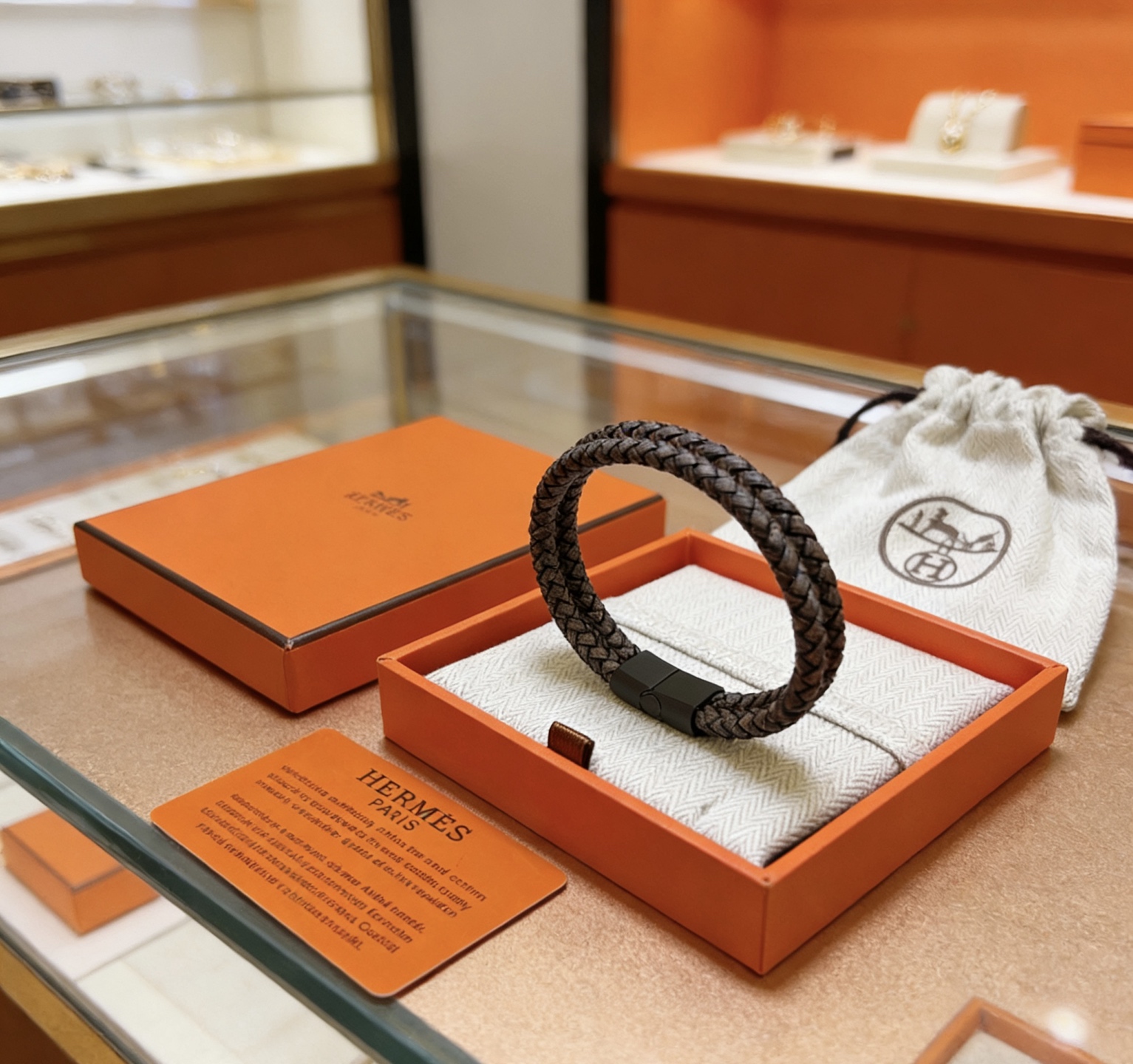Bracciale Hermes Tournis Tresse chiusura in metallo nero opaco pelle intrecciata grigio scuro 19 cm