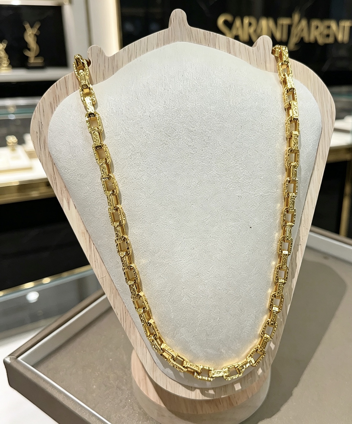 Saint Laurent Textured Chain Link necklace gold-tone metal with black enamel accents 60cm