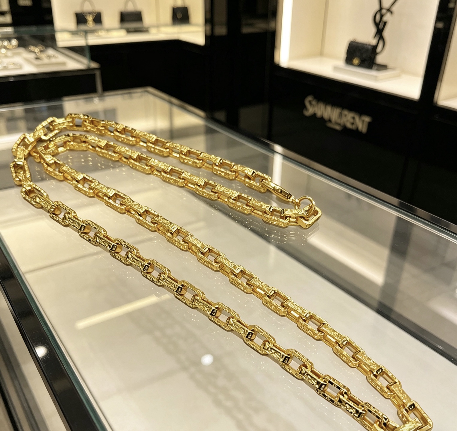 Saint Laurent Textured Chain Link necklace gold-tone metal with black enamel accents 60cm